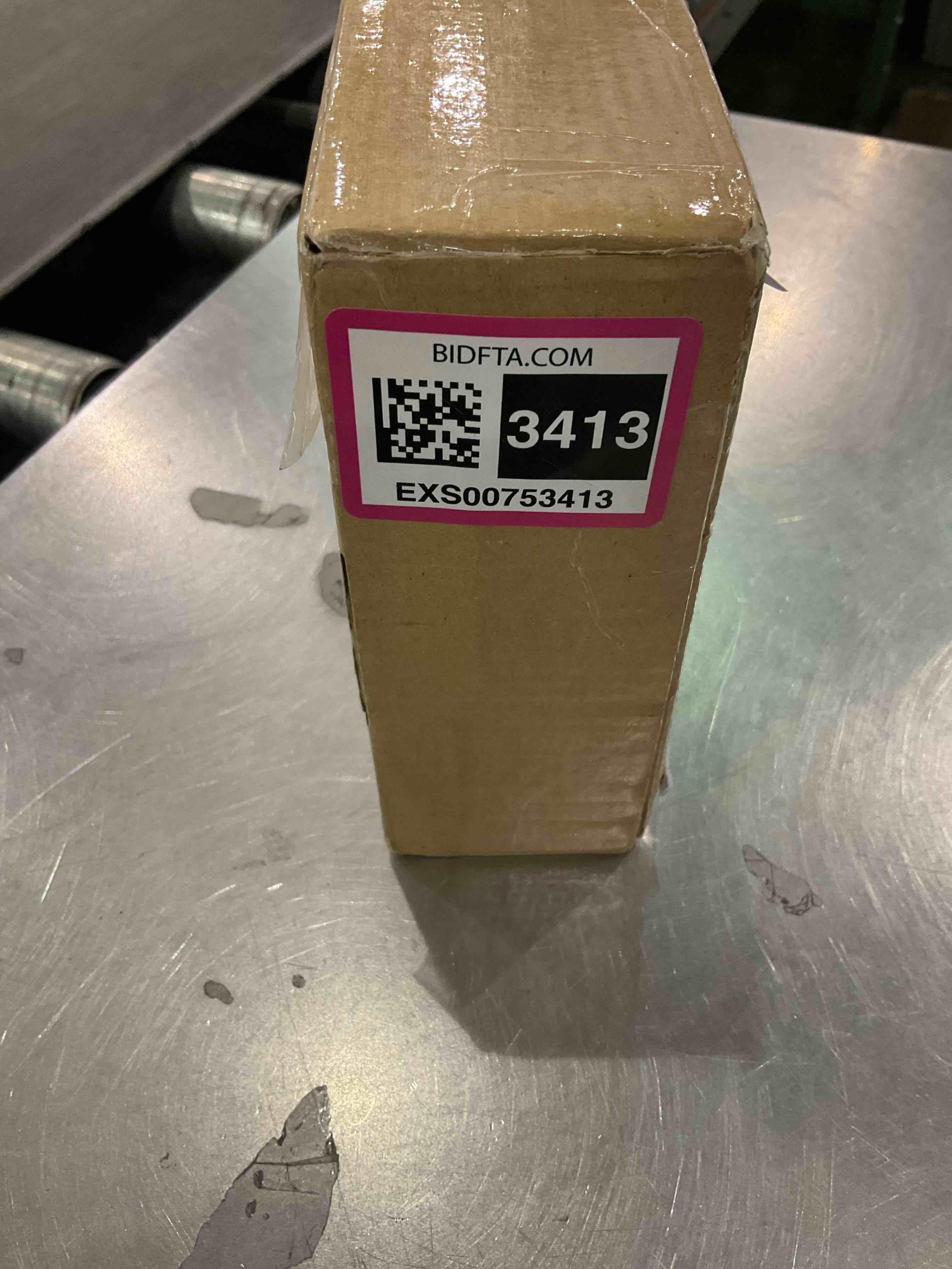 https://s3.amazonaws.com/lotting-images-prod/bidfta/EXS00753413_1703164673130.jpeg