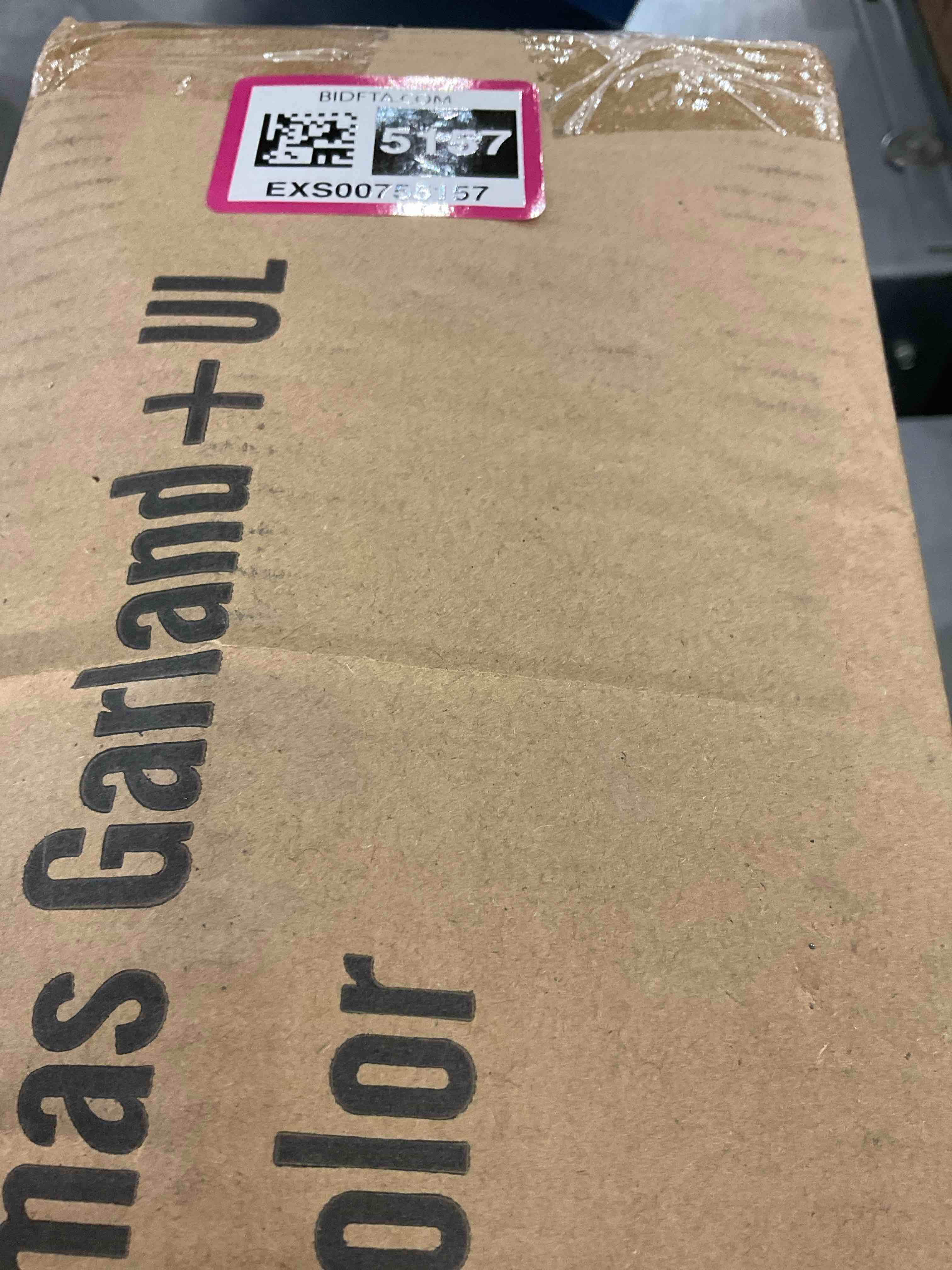 https://s3.amazonaws.com/lotting-images-prod/bidfta/EXS00755157_1702653464777.jpeg