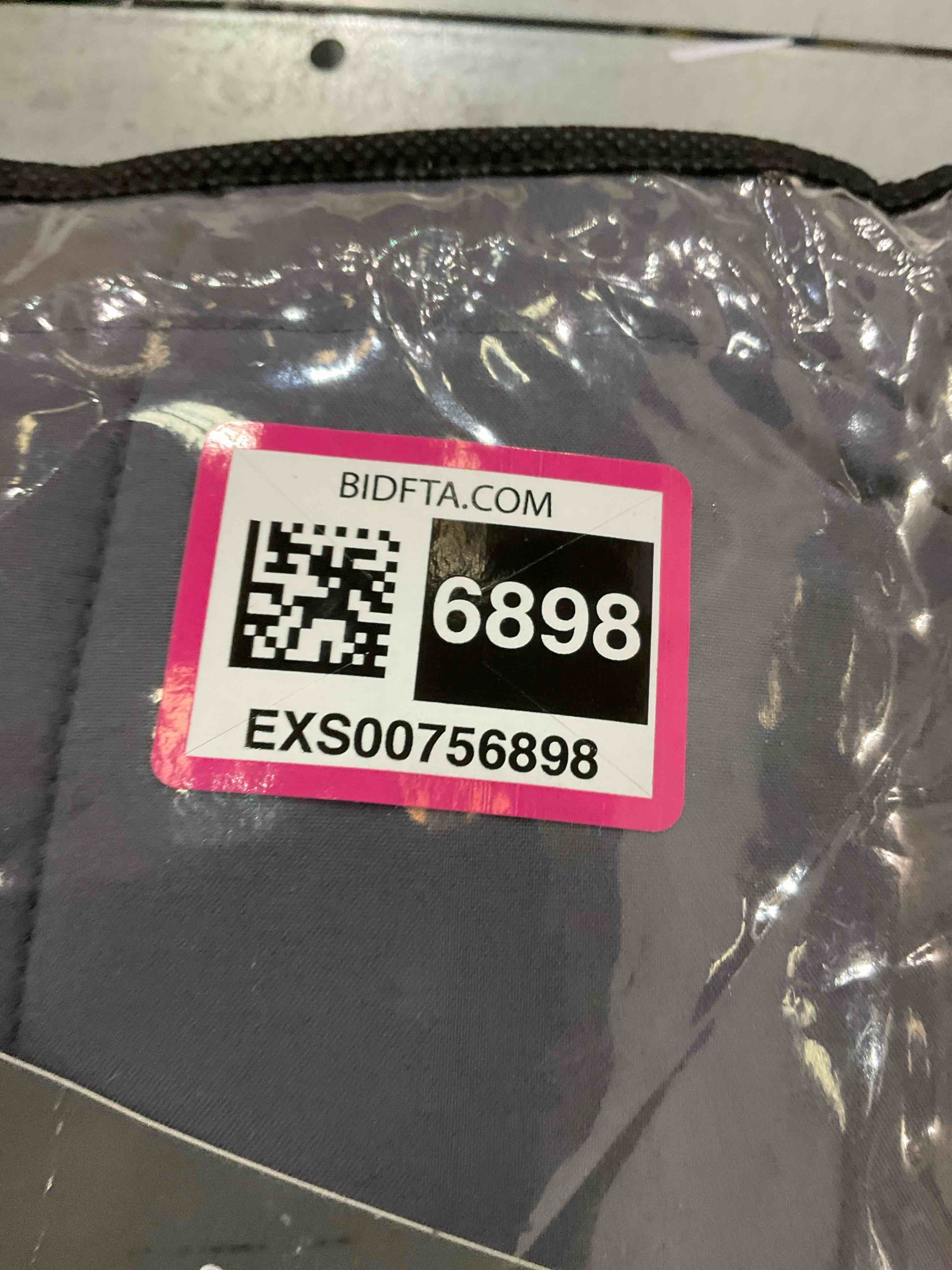 https://s3.amazonaws.com/lotting-images-prod/bidfta/EXS00756898_1703085485009.jpeg