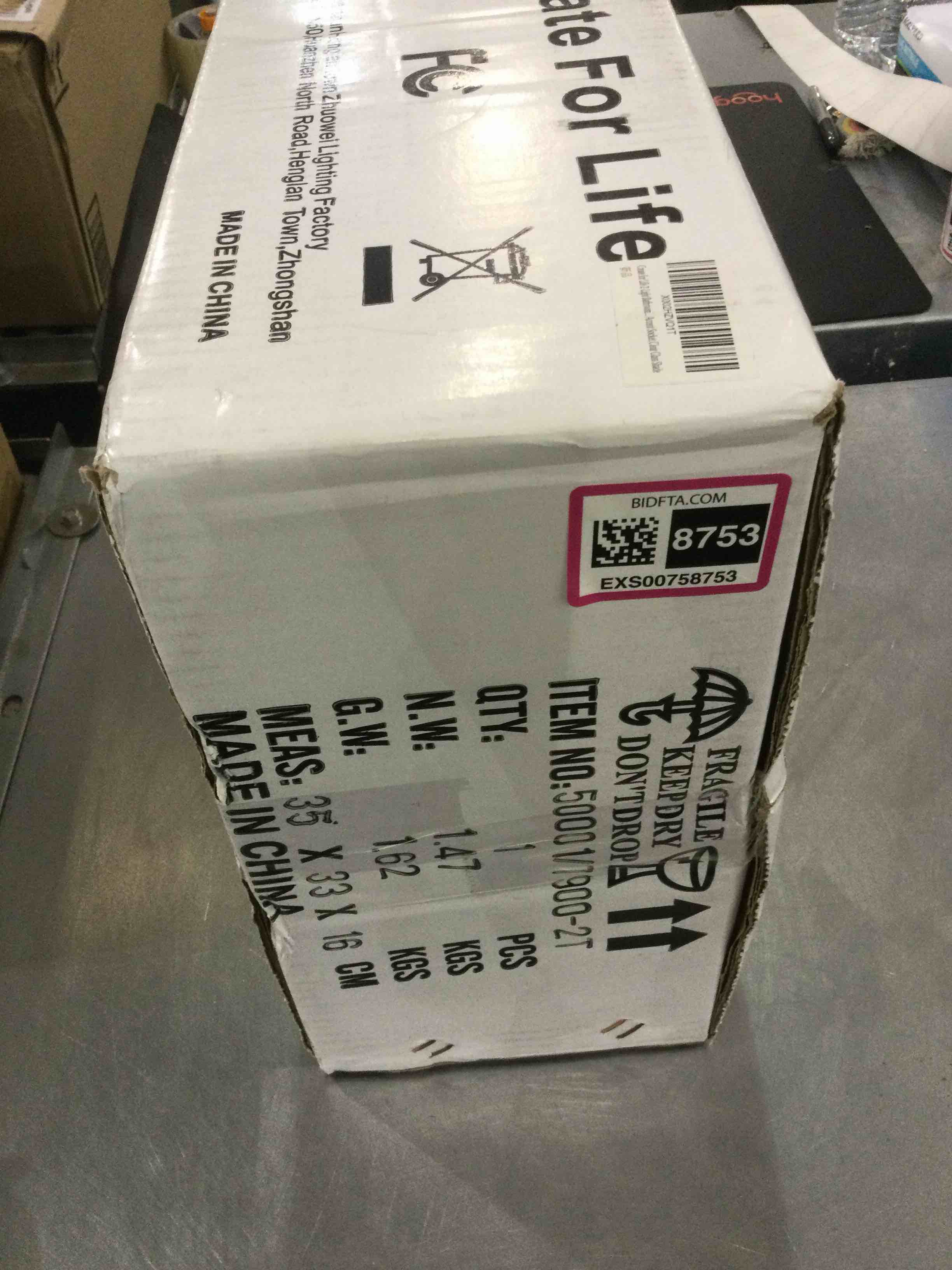 https://s3.amazonaws.com/lotting-images-prod/bidfta/EXS00758753_1702565062885.jpeg