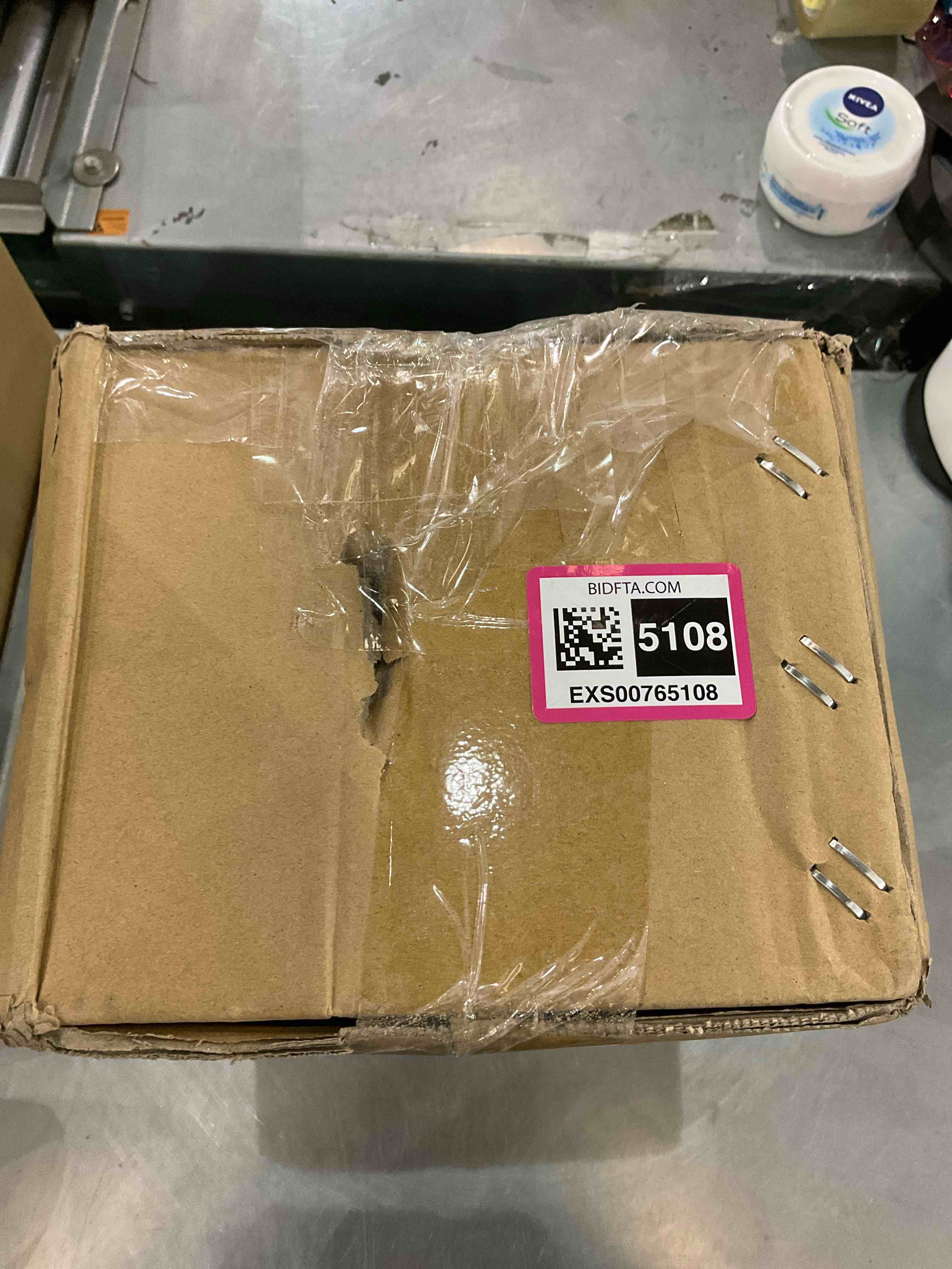 https://s3.amazonaws.com/lotting-images-prod/bidfta/EXS00765108_1700665771756.jpeg
