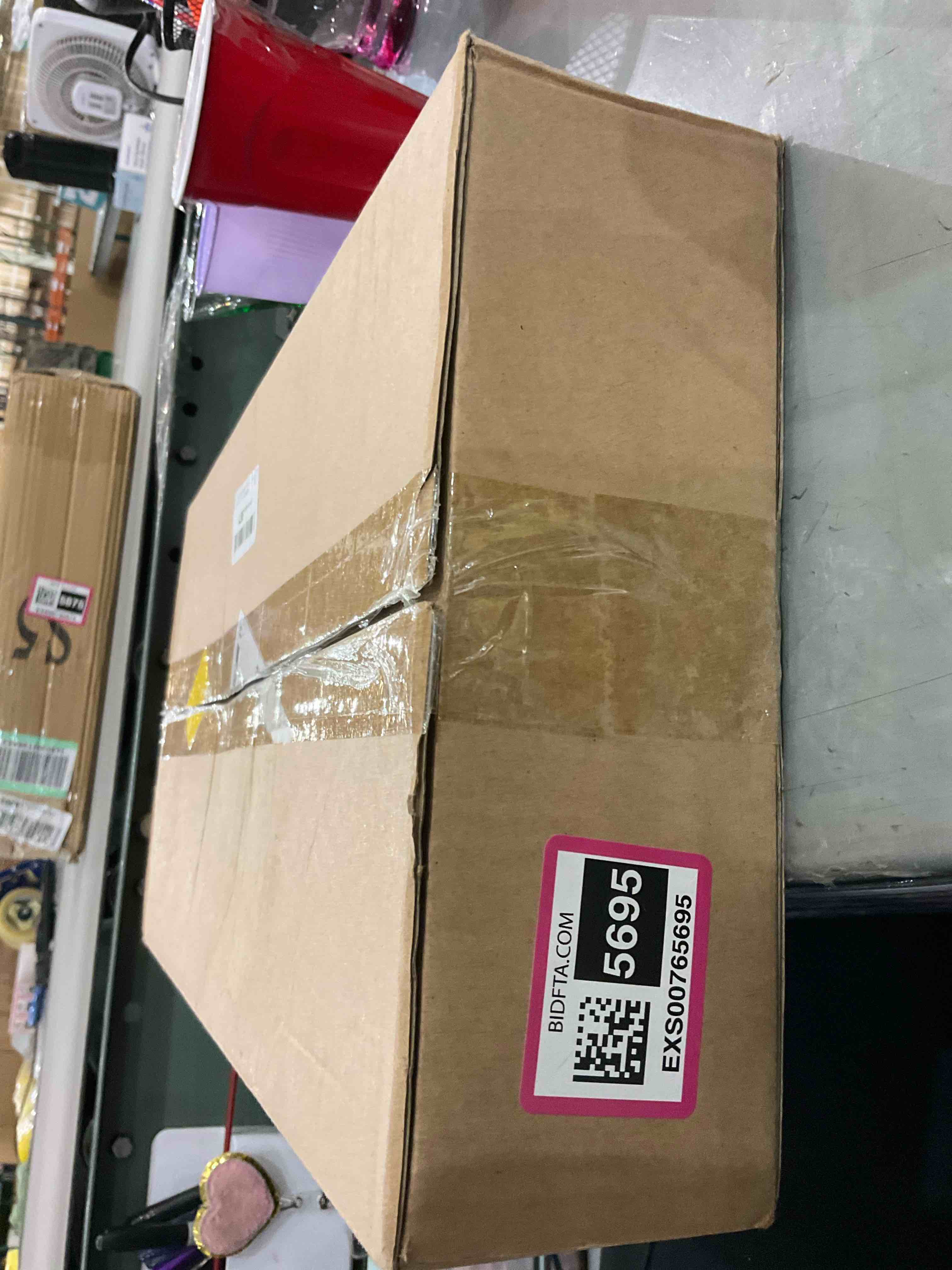 https://s3.amazonaws.com/lotting-images-prod/bidfta/EXS00765695_1701108266661.jpeg