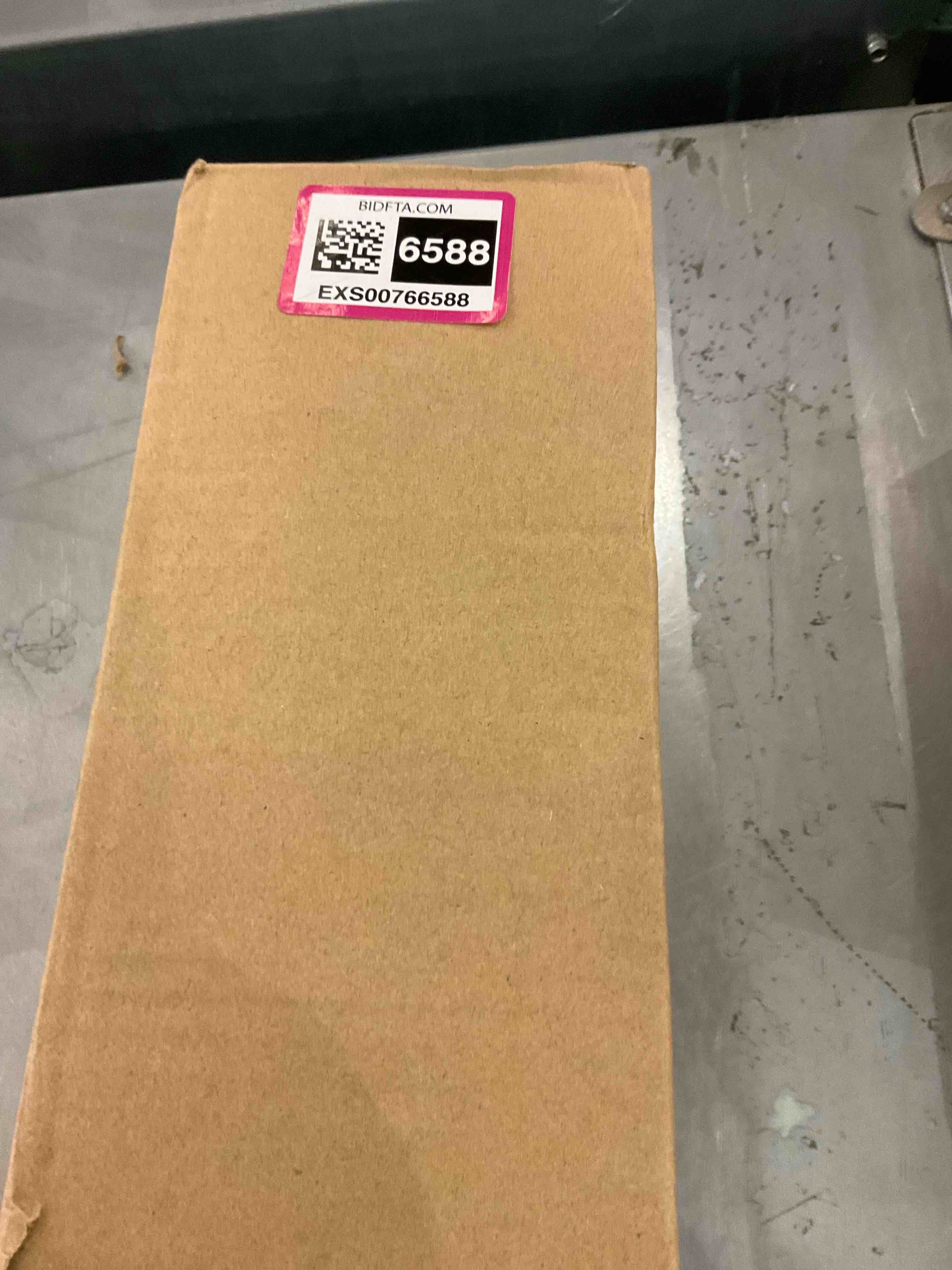 https://s3.amazonaws.com/lotting-images-prod/bidfta/EXS00766588_1701268914327.jpeg