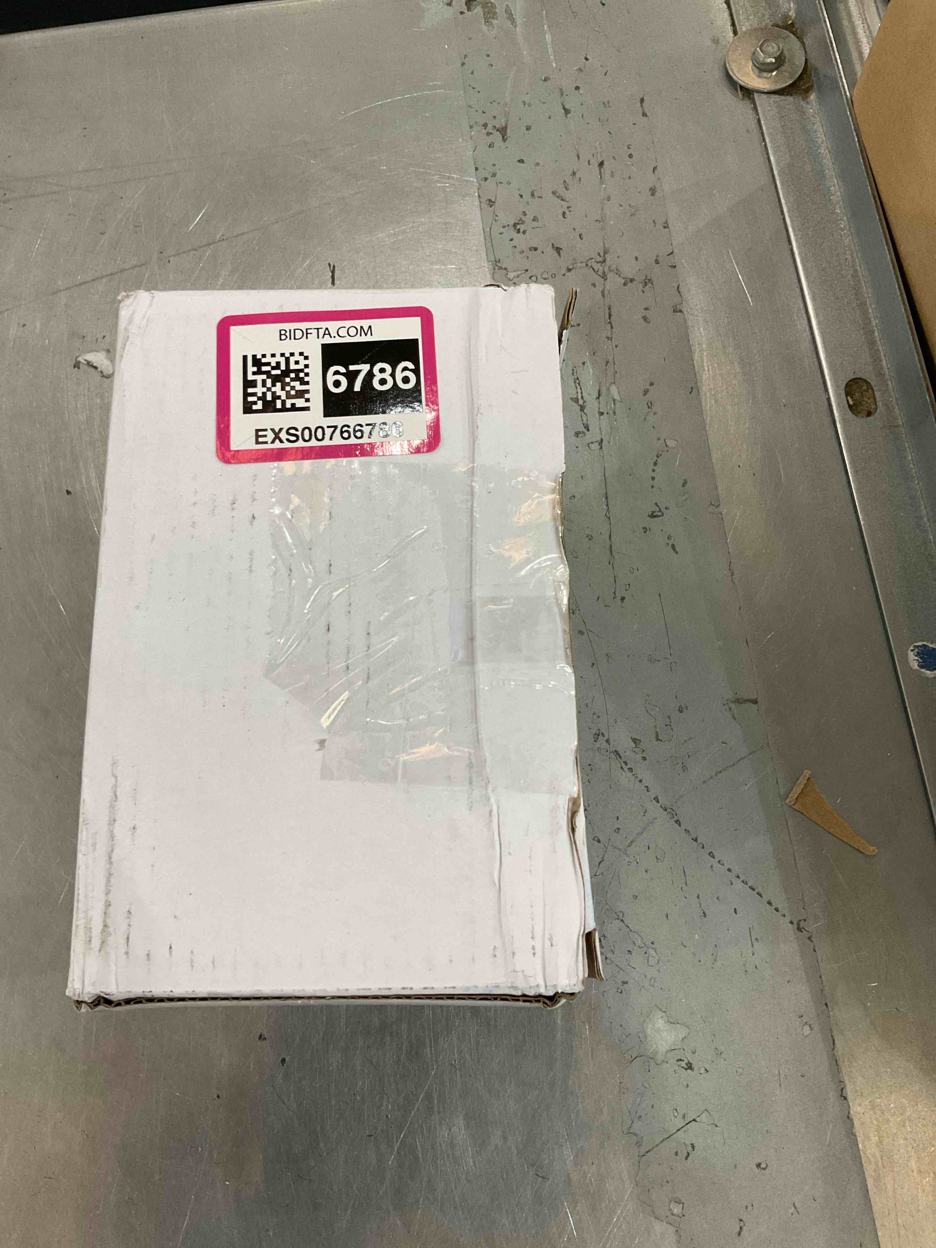 https://s3.amazonaws.com/lotting-images-prod/bidfta/EXS00766786_1701287014905.jpeg