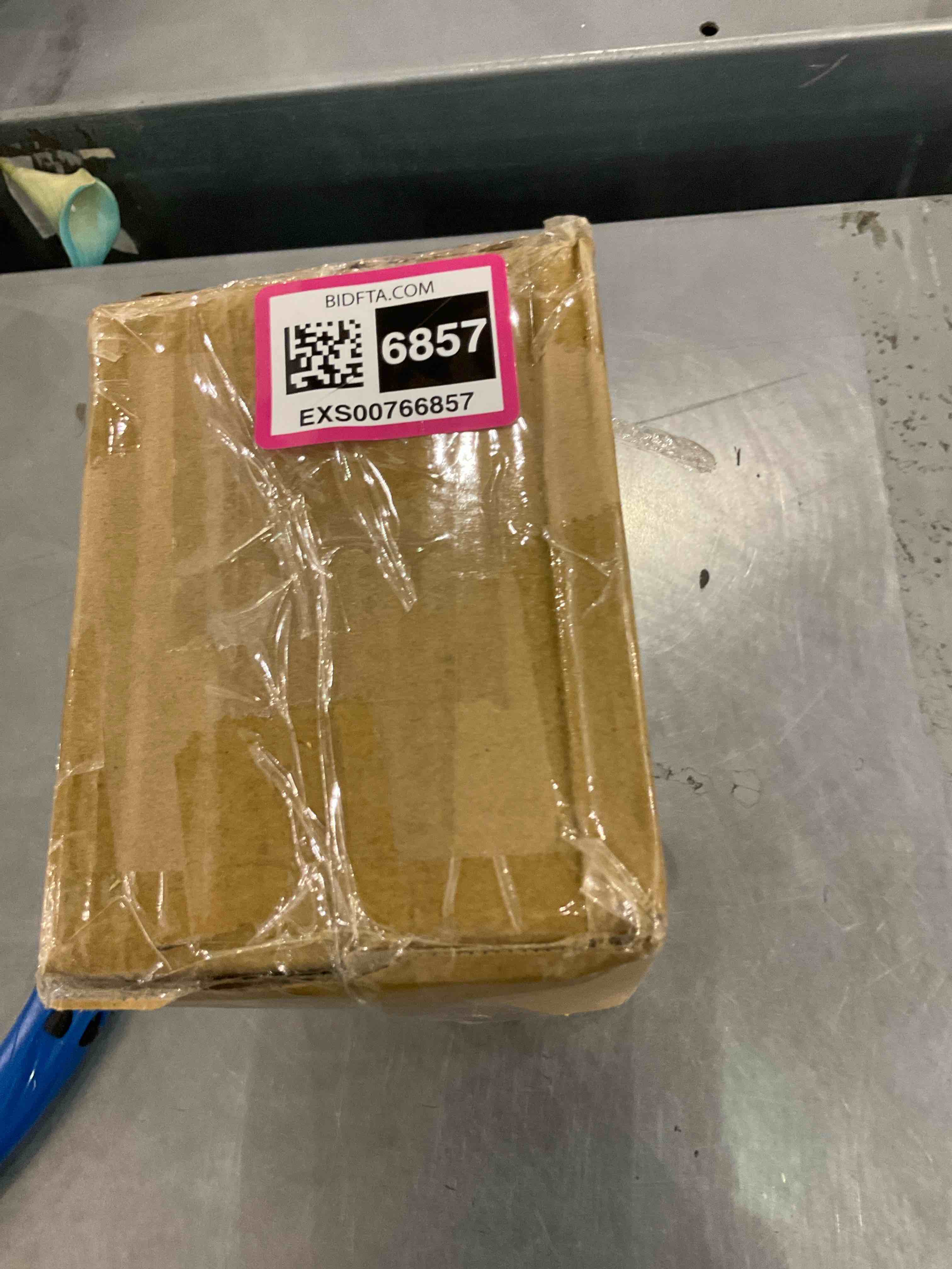 https://s3.amazonaws.com/lotting-images-prod/bidfta/EXS00766857_1701350042654.jpeg
