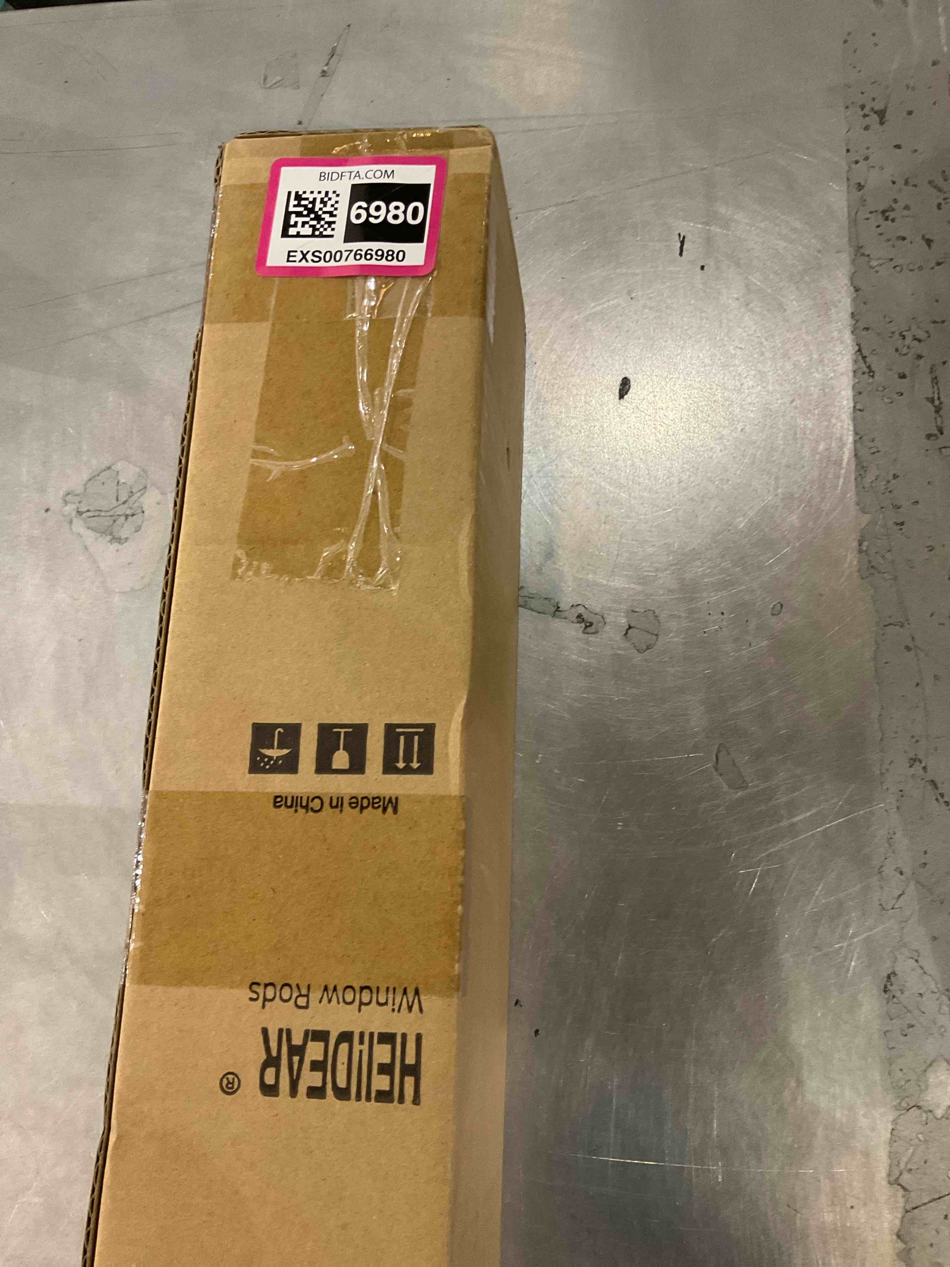 https://s3.amazonaws.com/lotting-images-prod/bidfta/EXS00766980_1701362290455.jpeg