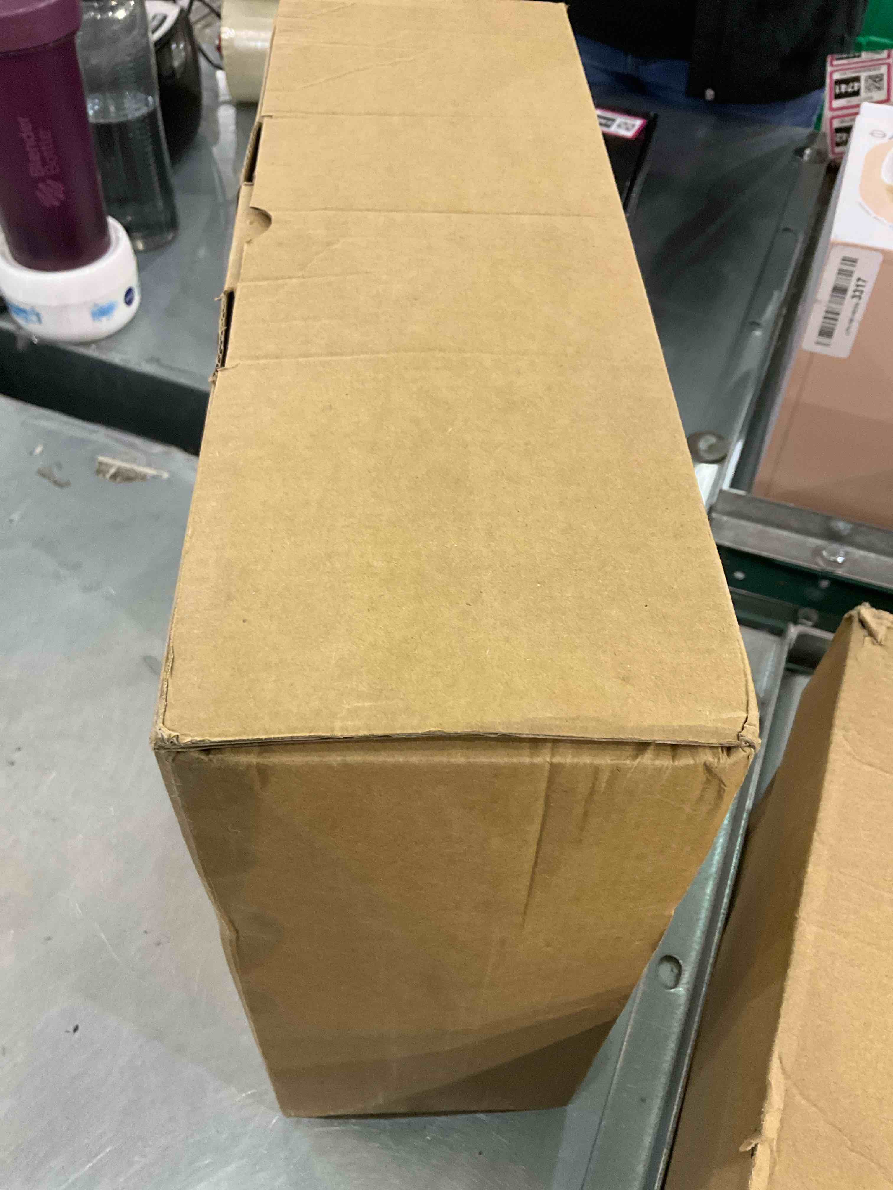 https://s3.amazonaws.com/lotting-images-prod/bidfta/EXS00772887_1701449584413.jpeg