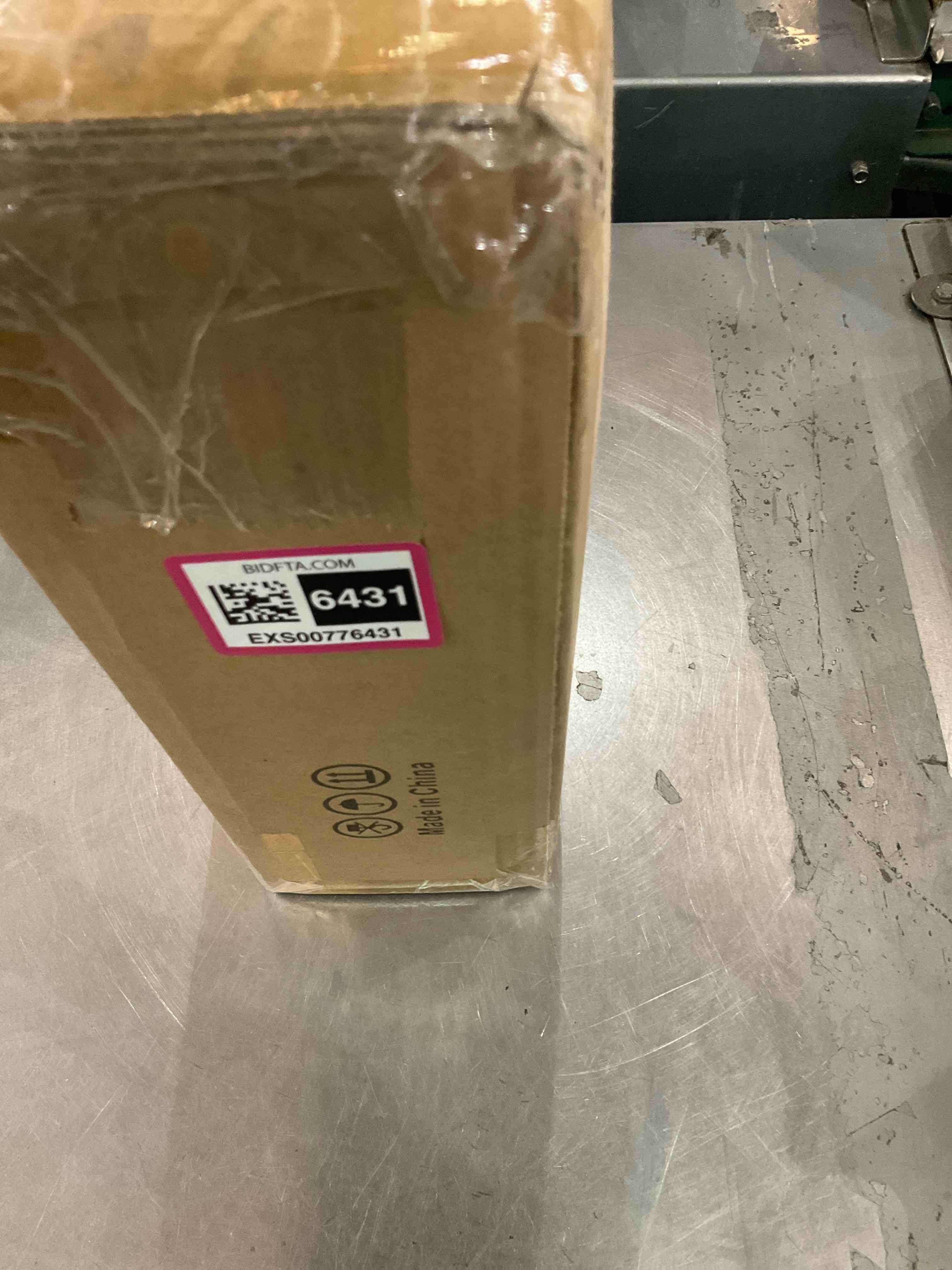 https://s3.amazonaws.com/lotting-images-prod/bidfta/EXS00776431_1701886943383.jpeg