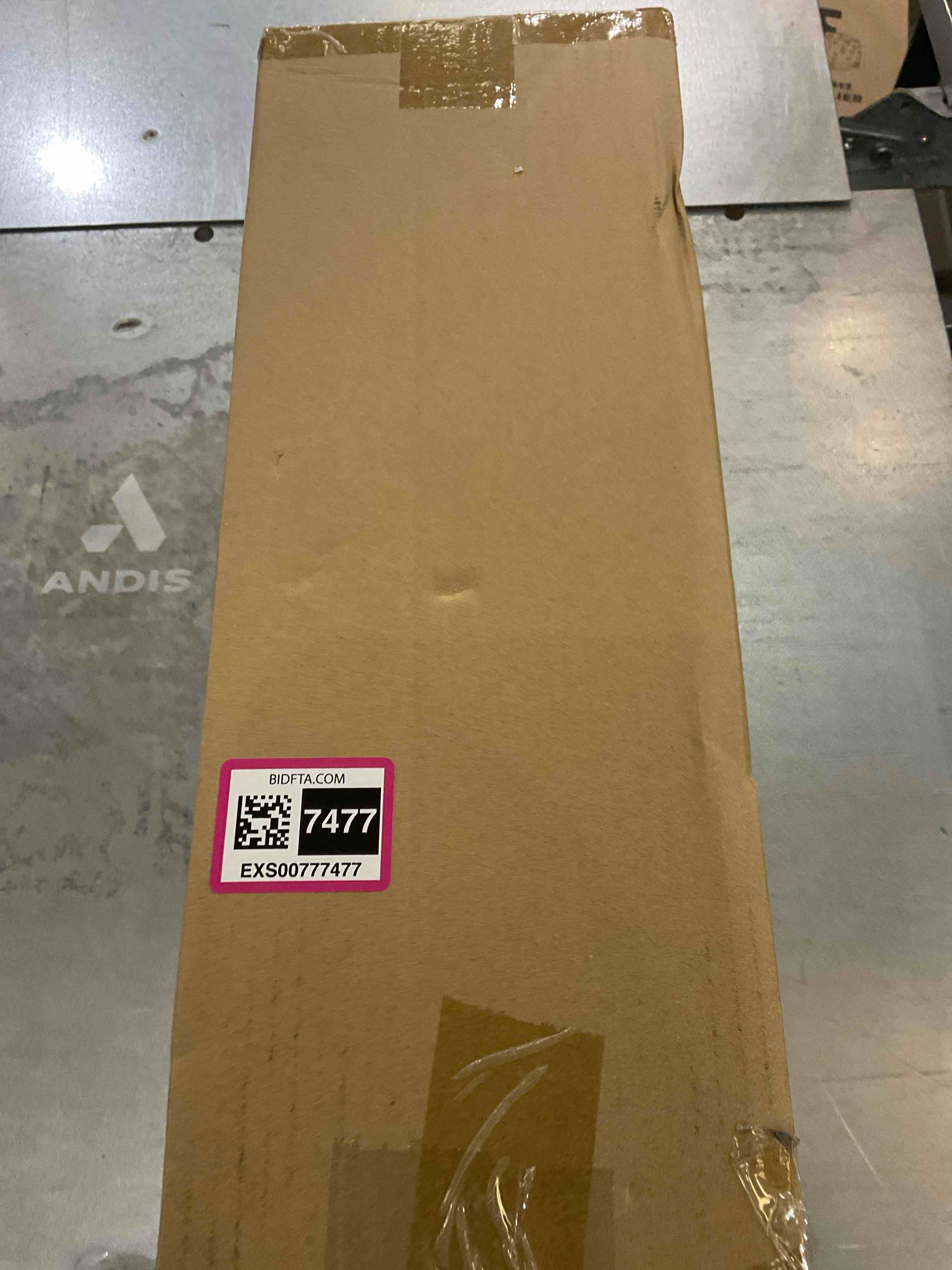 https://s3.amazonaws.com/lotting-images-prod/bidfta/EXS00777477_1702050596730.jpeg