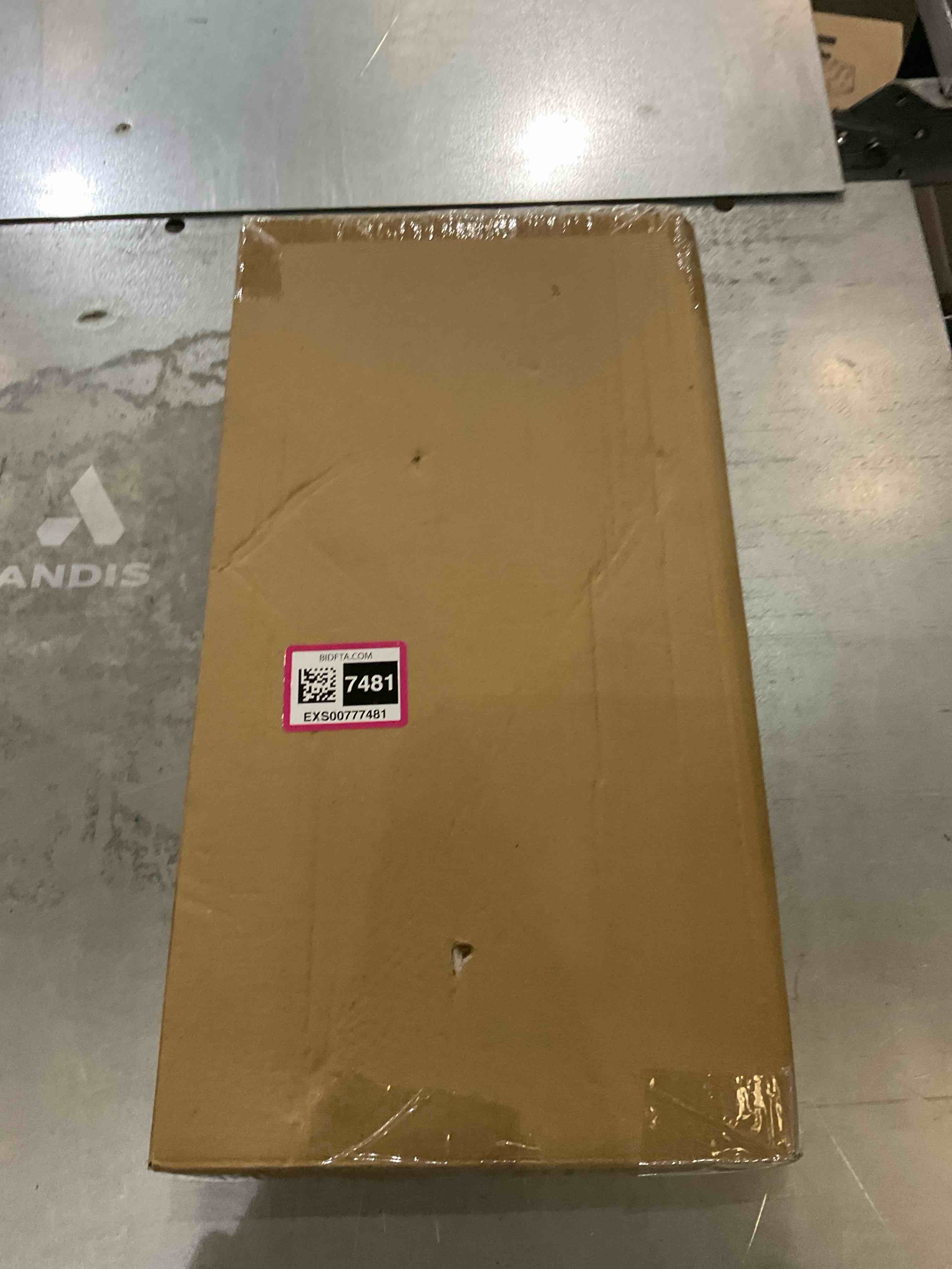 https://s3.amazonaws.com/lotting-images-prod/bidfta/EXS00777481_1702051018603.jpeg