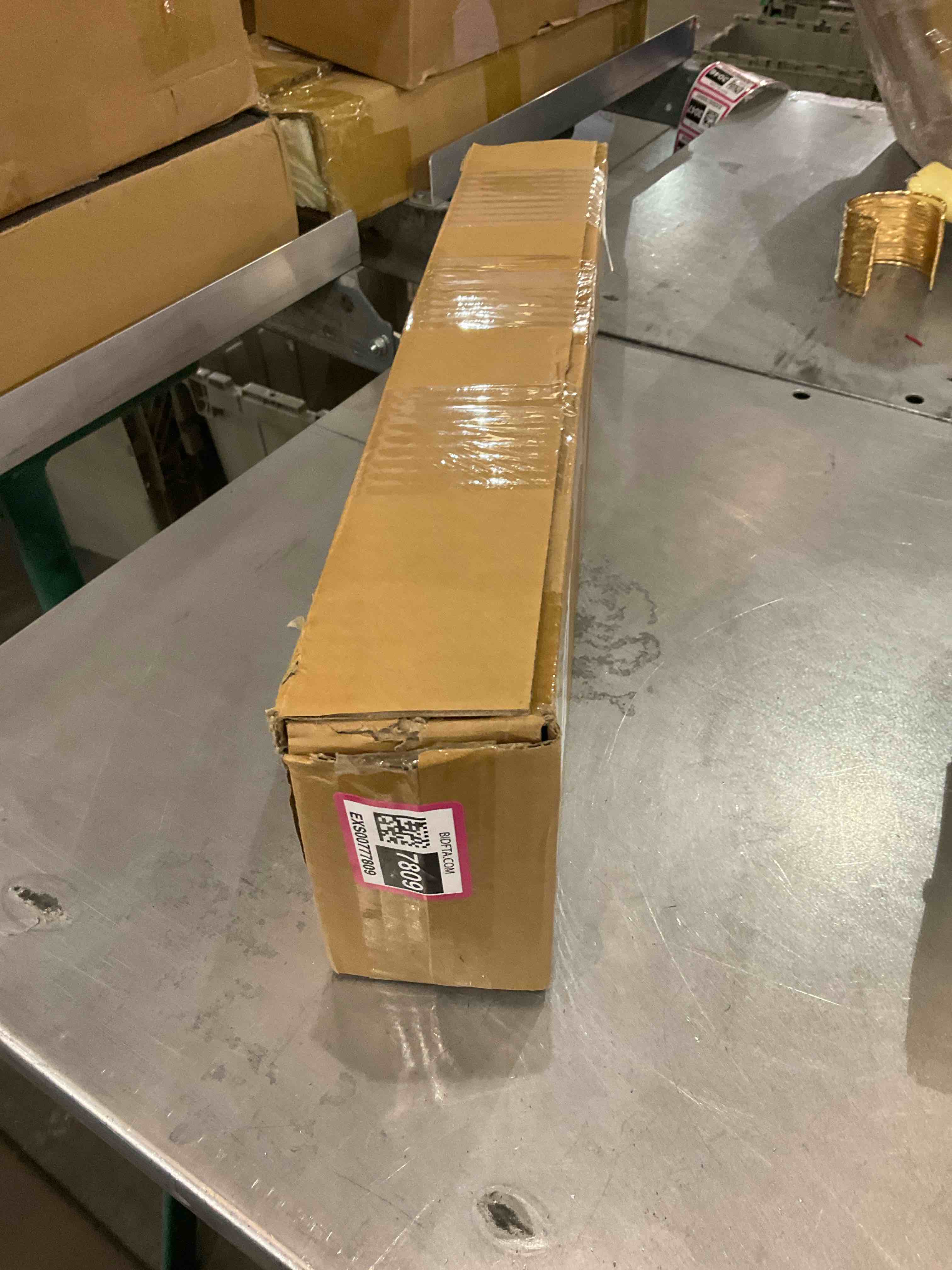 https://s3.amazonaws.com/lotting-images-prod/bidfta/EXS00777809_1702050135639.jpeg