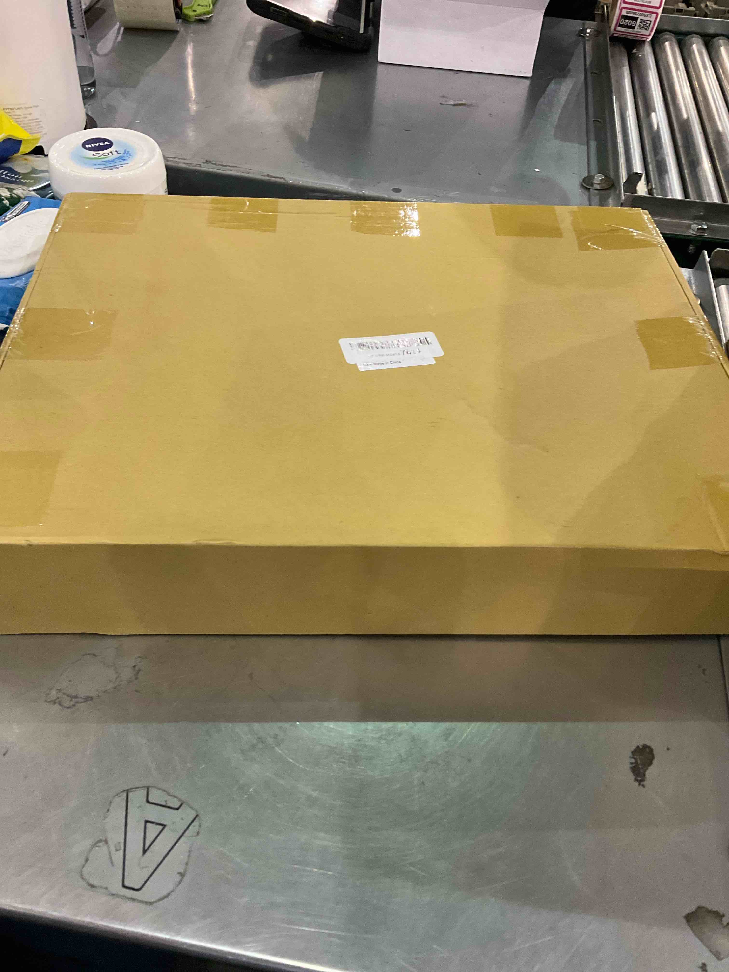 https://s3.amazonaws.com/lotting-images-prod/bidfta/EXS00778791_1701866376931.jpeg