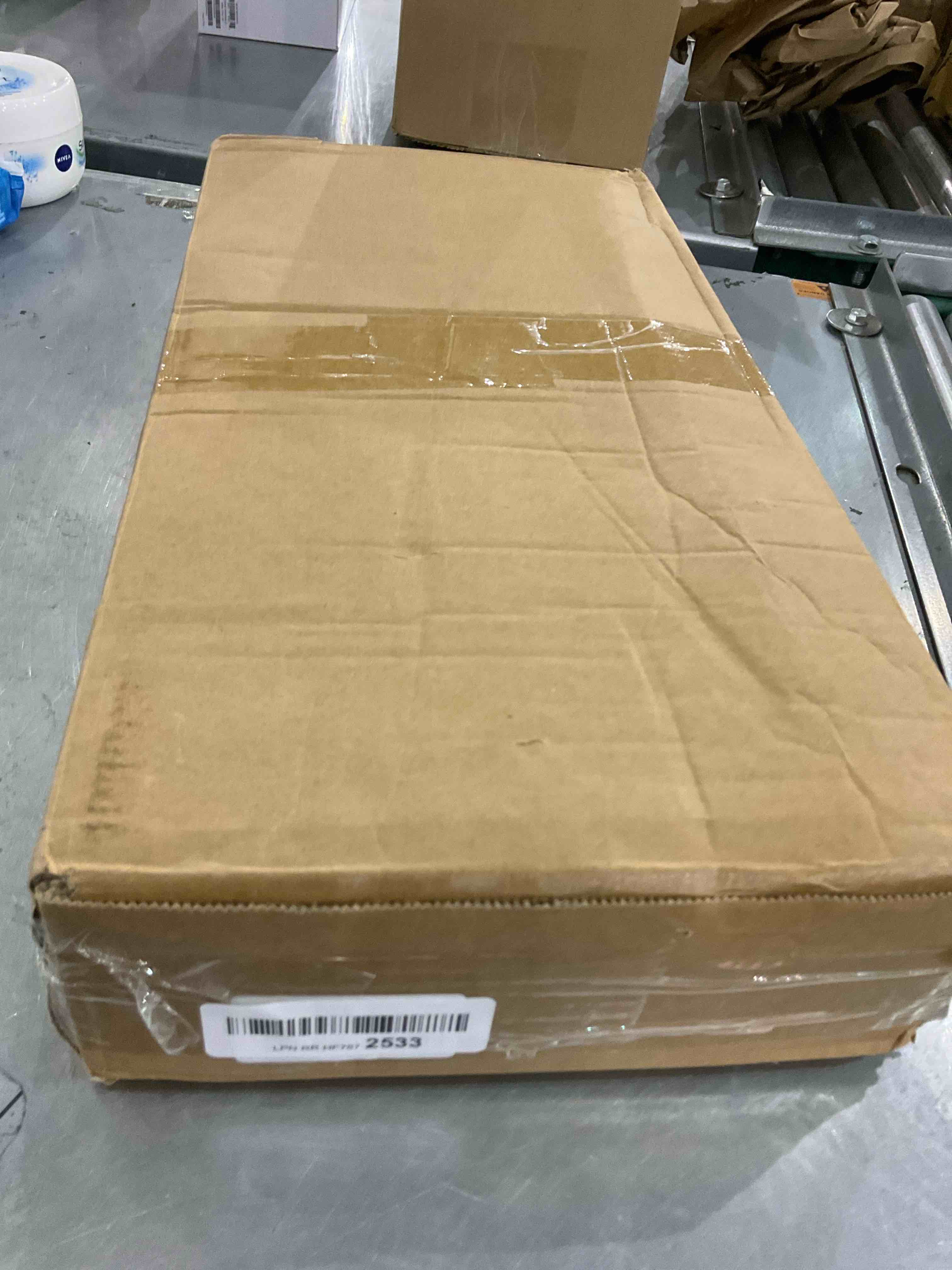 https://s3.amazonaws.com/lotting-images-prod/bidfta/EXS00778801_1701867562383.jpeg