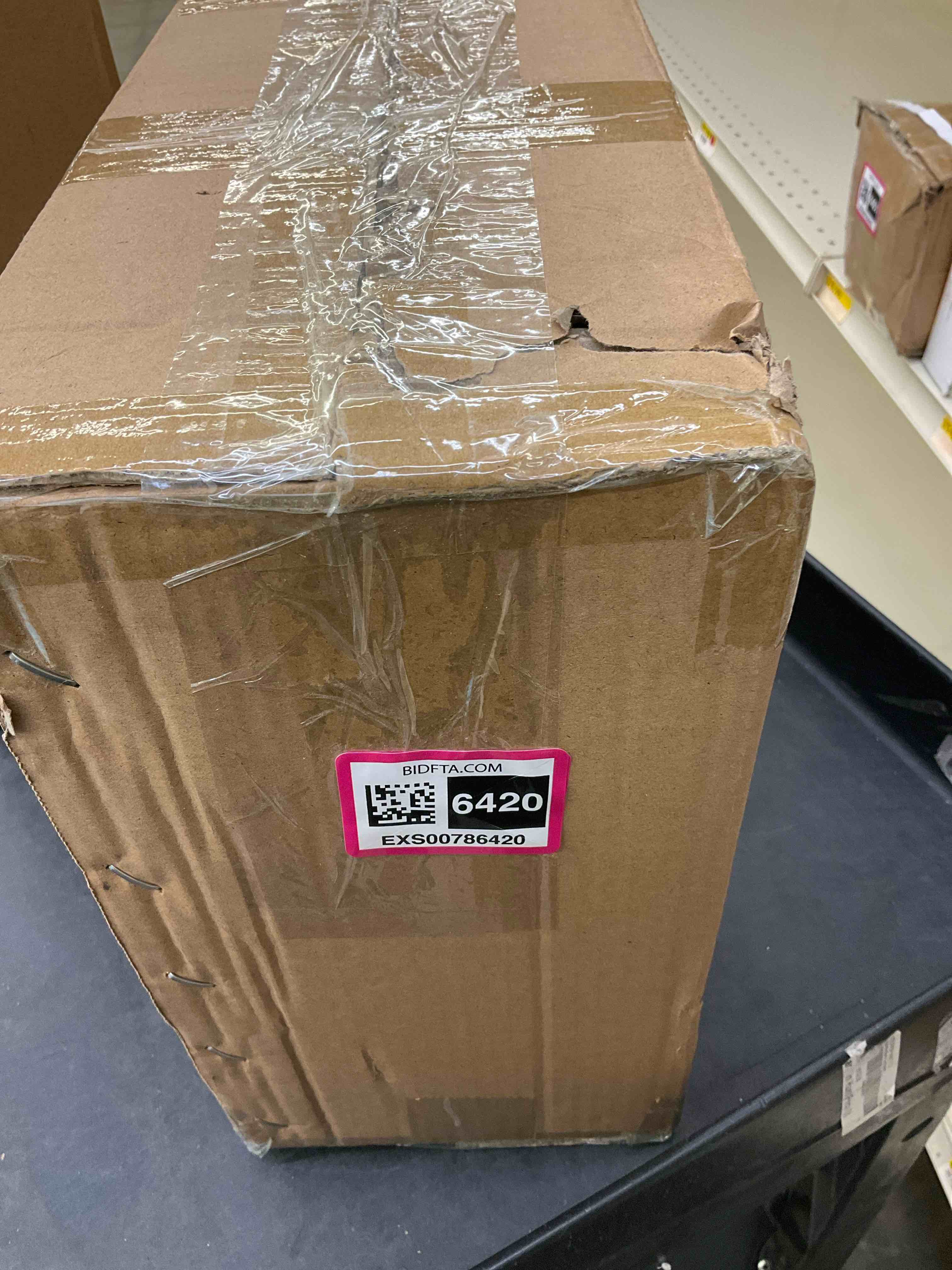https://s3.amazonaws.com/lotting-images-prod/bidfta/EXS00786420_1704309774491.jpeg