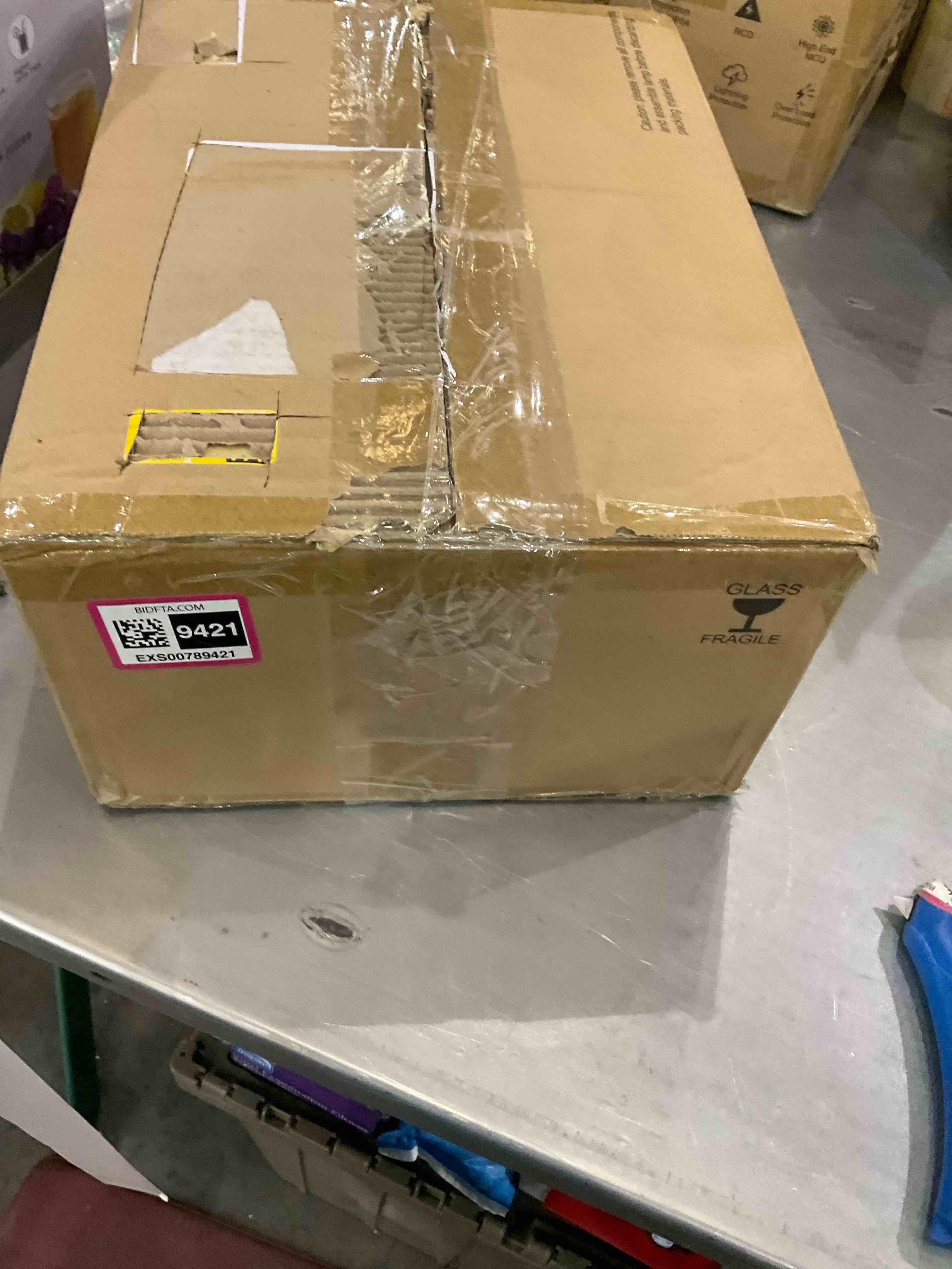 https://s3.amazonaws.com/lotting-images-prod/bidfta/EXS00789421_1702306079258.jpeg