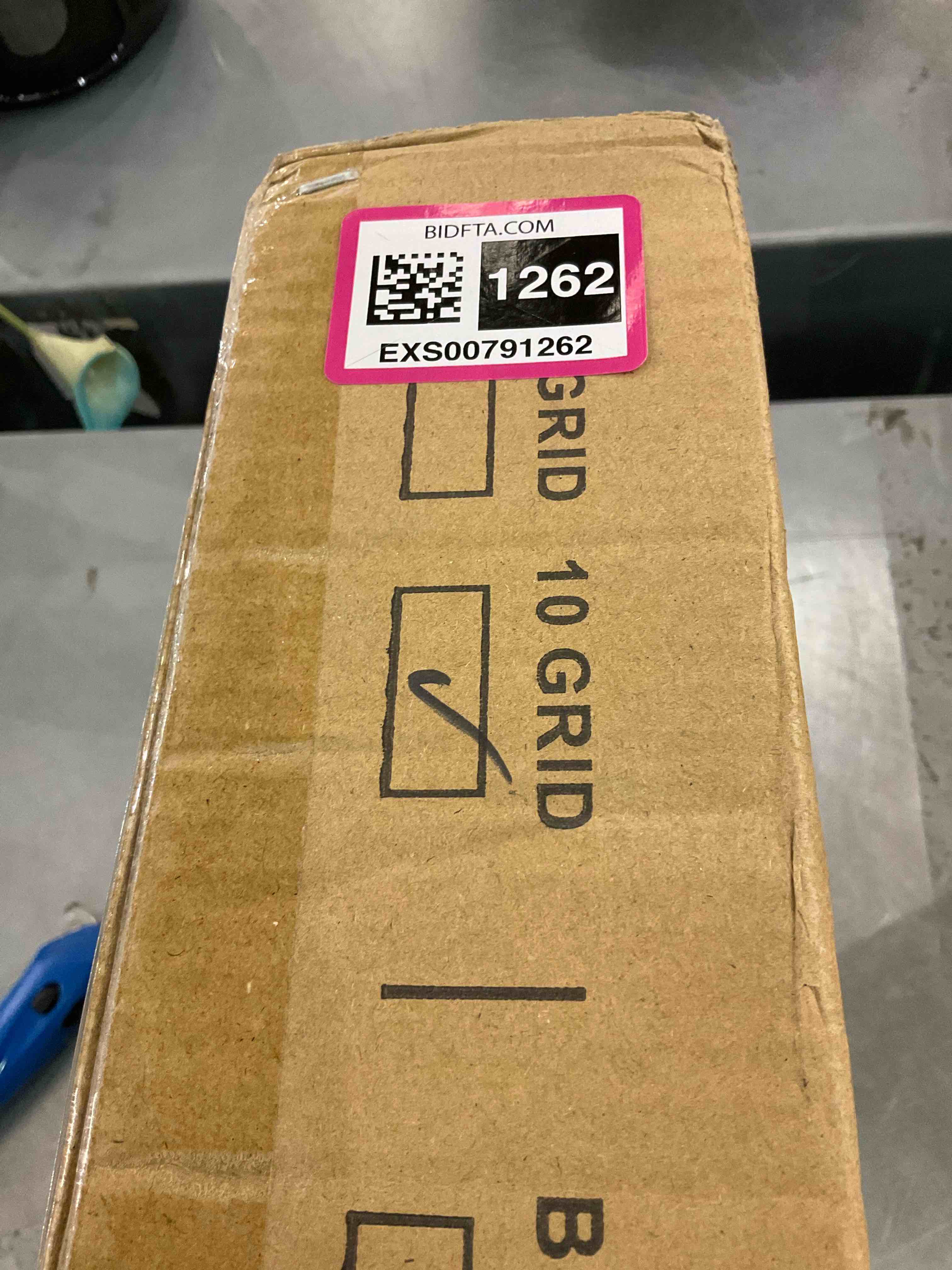 https://s3.amazonaws.com/lotting-images-prod/bidfta/EXS00791262_1701454059056.jpeg