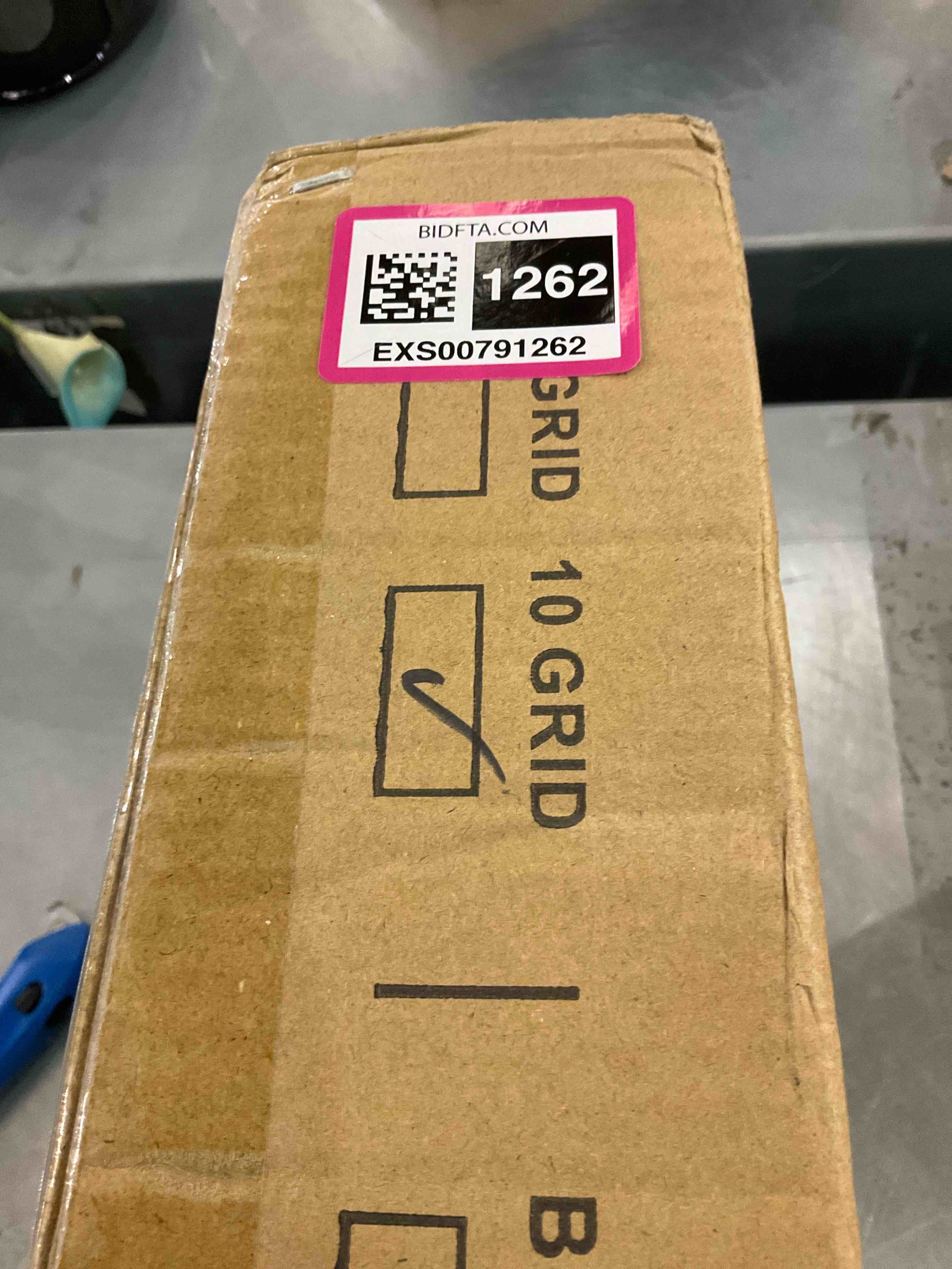 https://s3.amazonaws.com/lotting-images-prod/bidfta/EXS00791262_1701454060082.jpeg