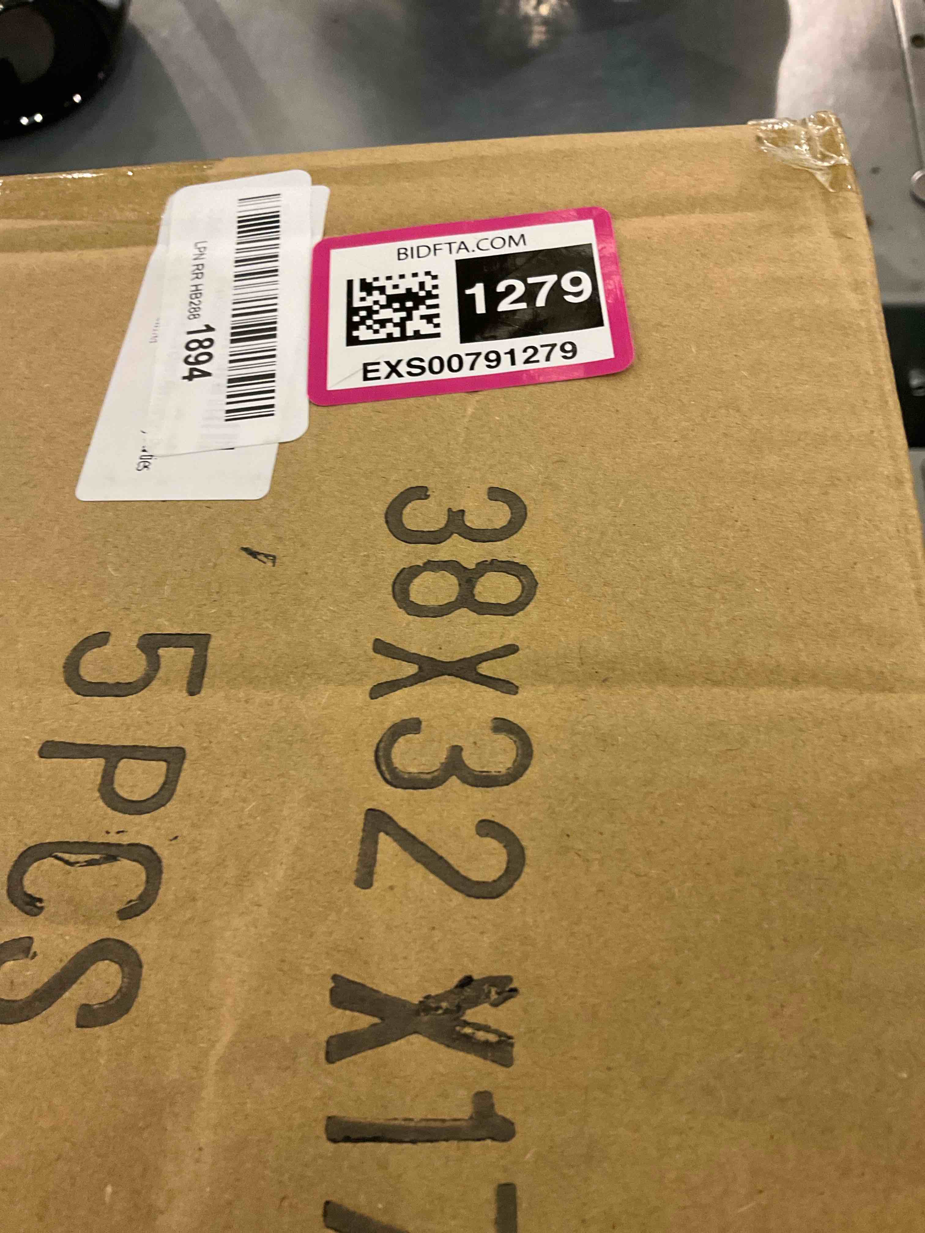 https://s3.amazonaws.com/lotting-images-prod/bidfta/EXS00791279_1701455821492.jpeg