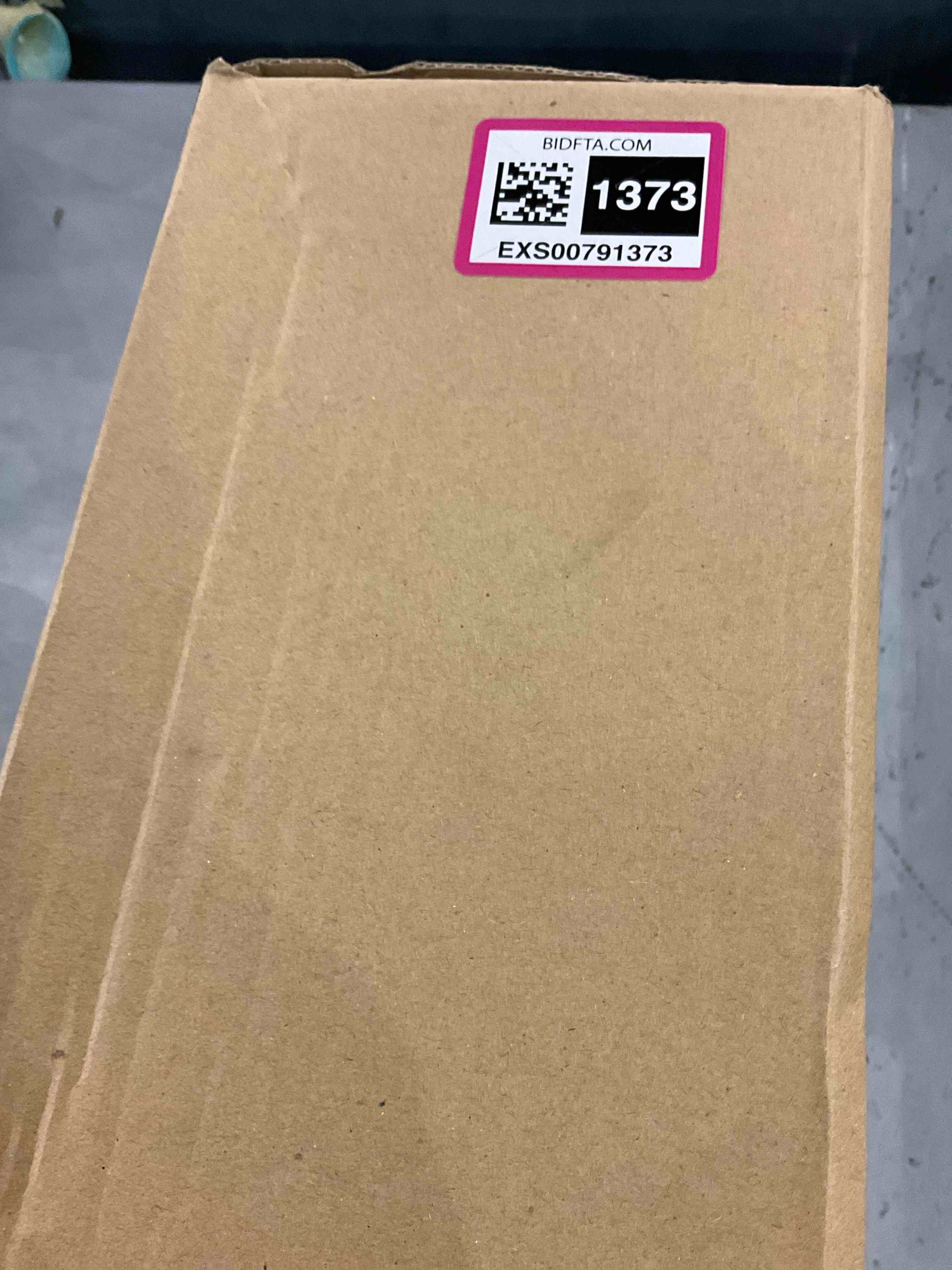 https://s3.amazonaws.com/lotting-images-prod/bidfta/EXS00791373_1701696190055.jpeg