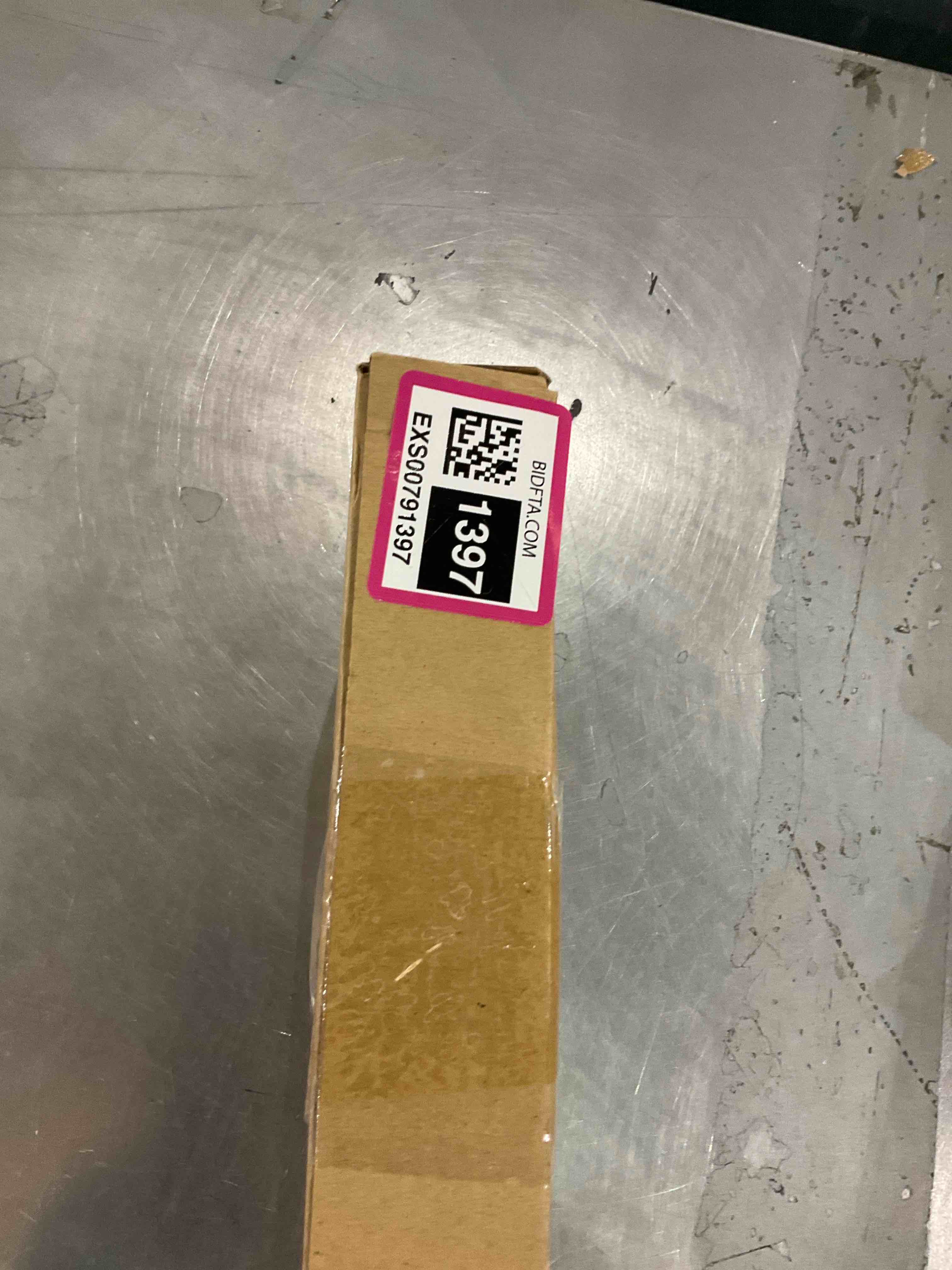 https://s3.amazonaws.com/lotting-images-prod/bidfta/EXS00791397_1701698151598.jpeg