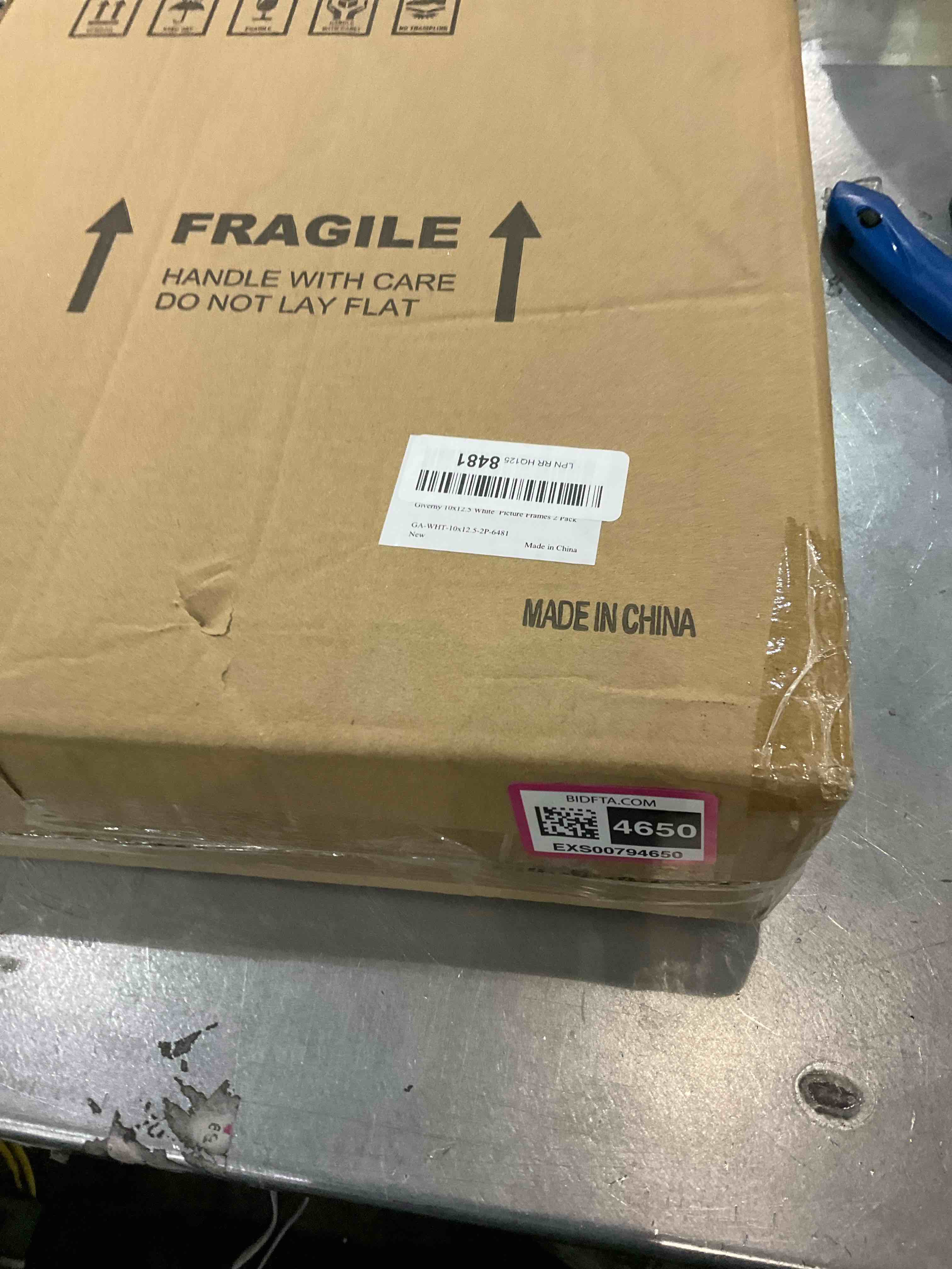 https://s3.amazonaws.com/lotting-images-prod/bidfta/EXS00794650_1704807707612.jpeg