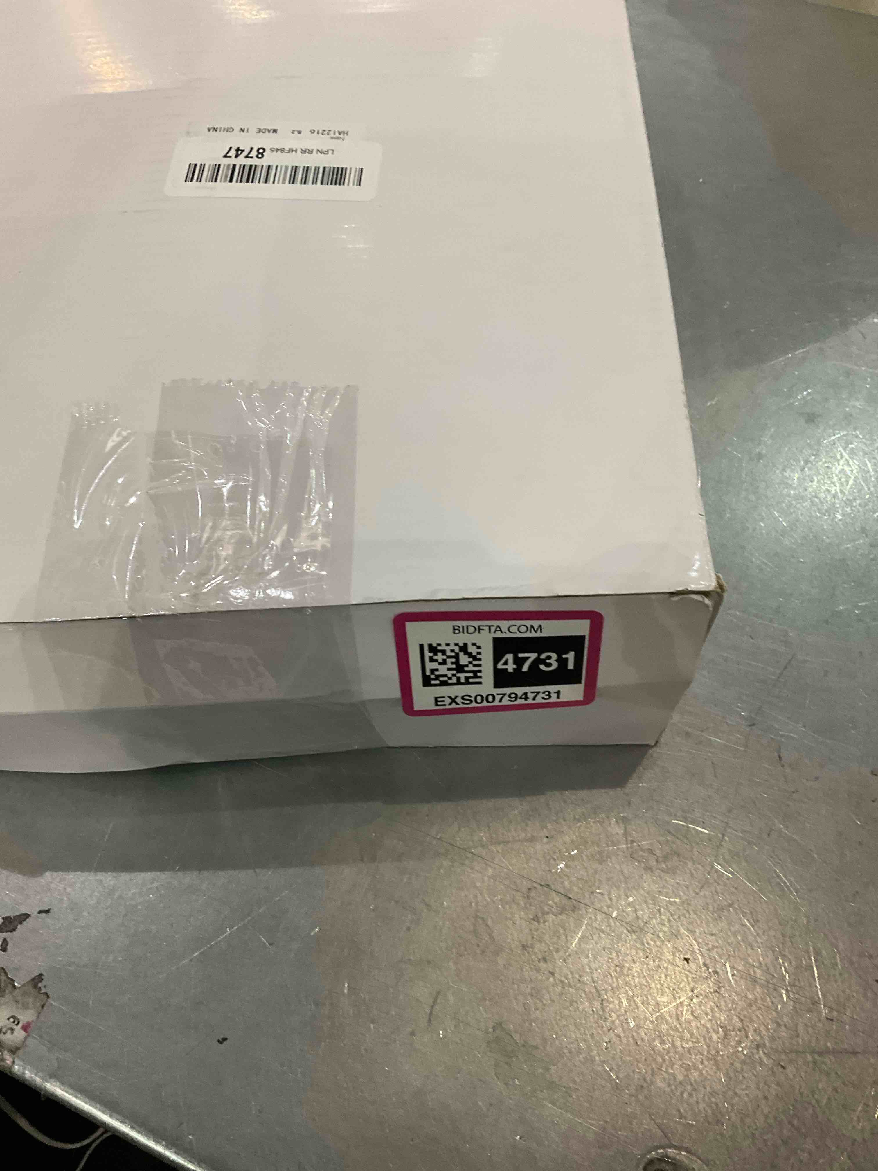 https://s3.amazonaws.com/lotting-images-prod/bidfta/EXS00794731_1704816463992.jpeg