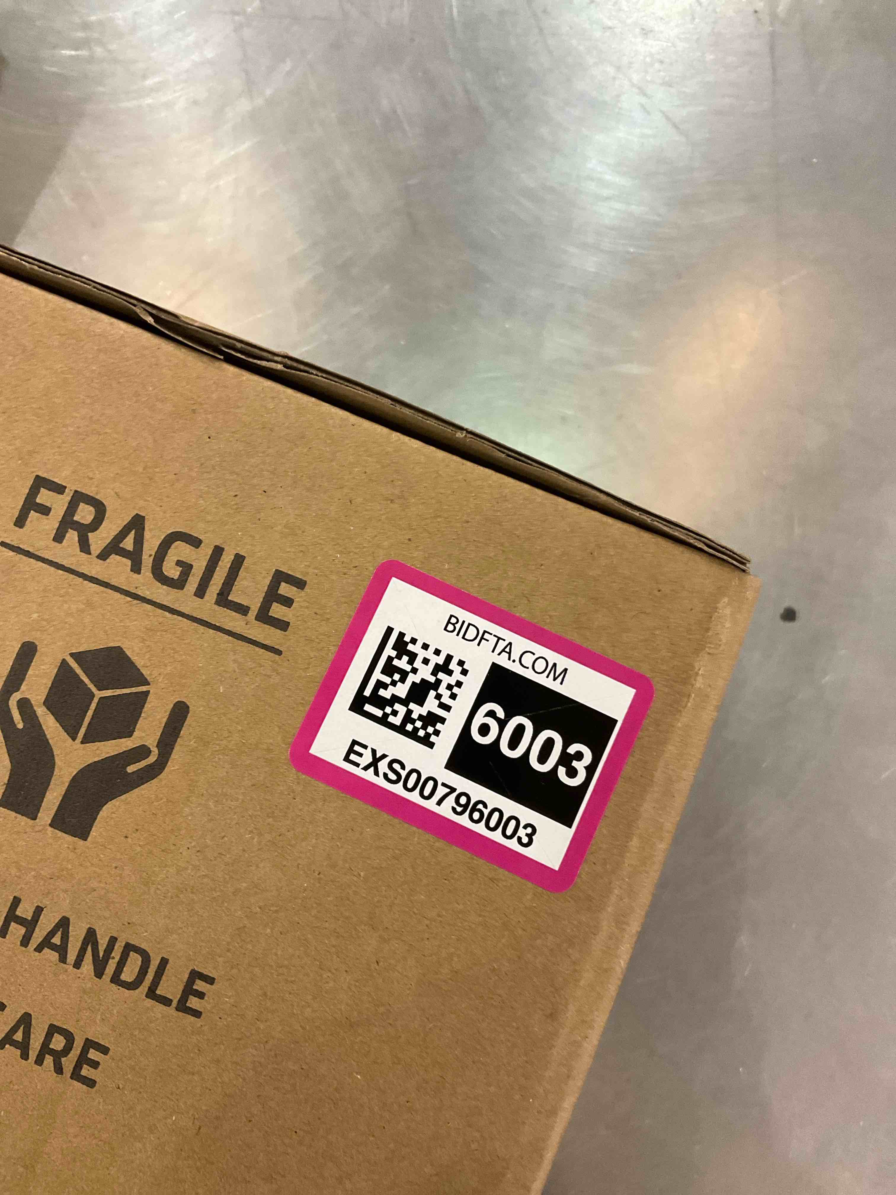 https://s3.amazonaws.com/lotting-images-prod/bidfta/EXS00796003_1701962885787.jpeg