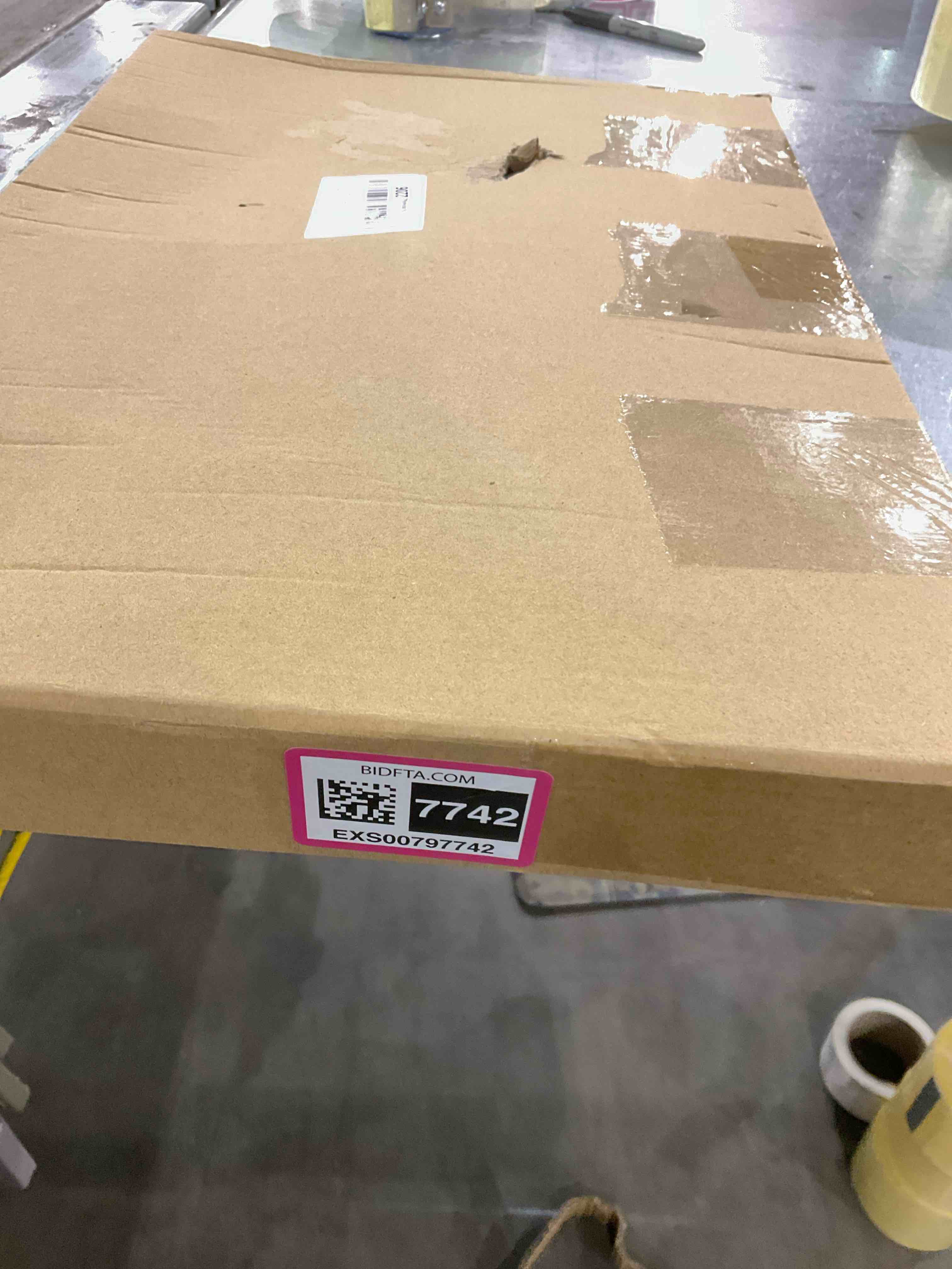 https://s3.amazonaws.com/lotting-images-prod/bidfta/EXS00797742_1700658814576.jpeg