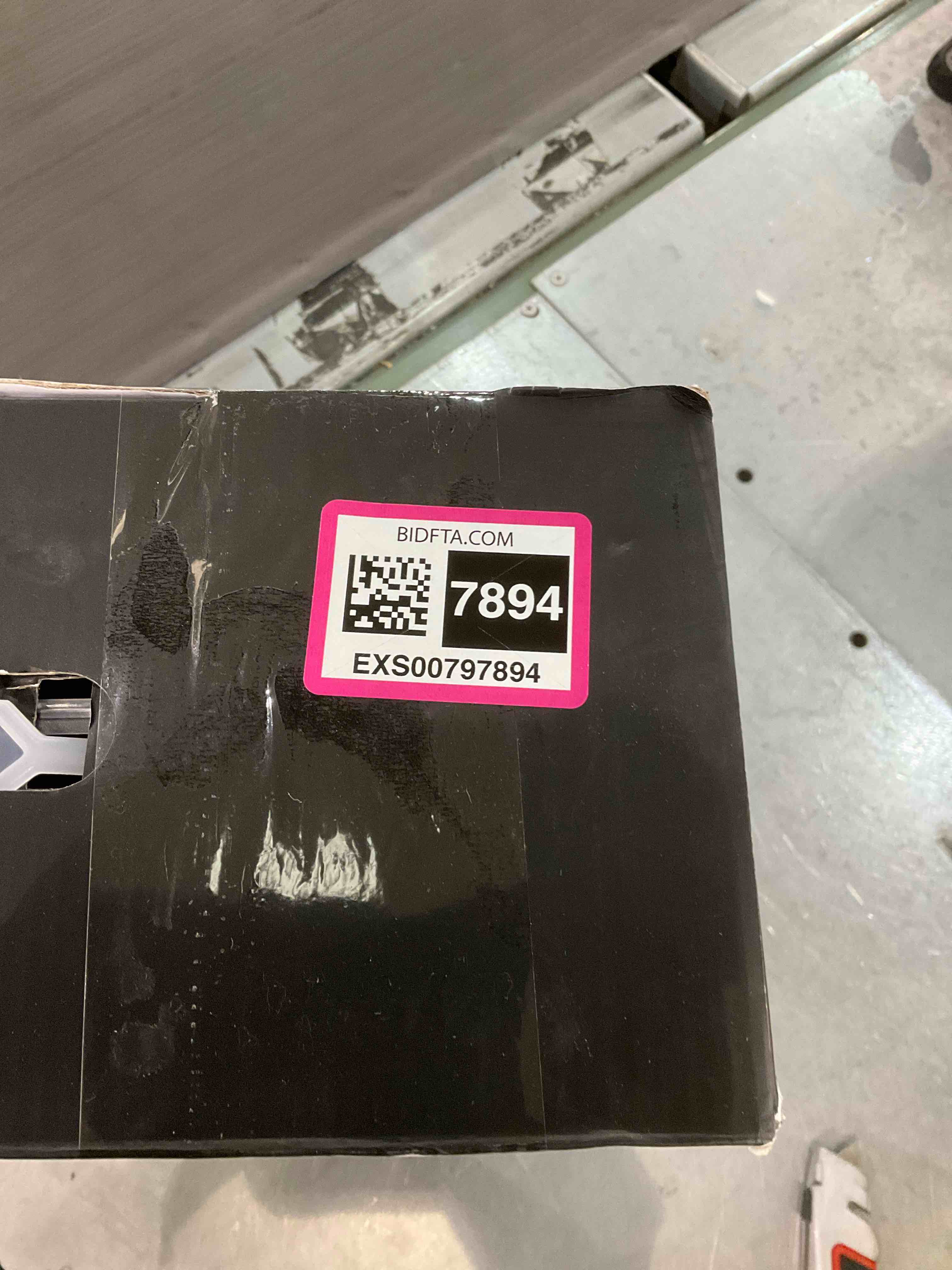 https://s3.amazonaws.com/lotting-images-prod/bidfta/EXS00797894_1701091713434.jpeg