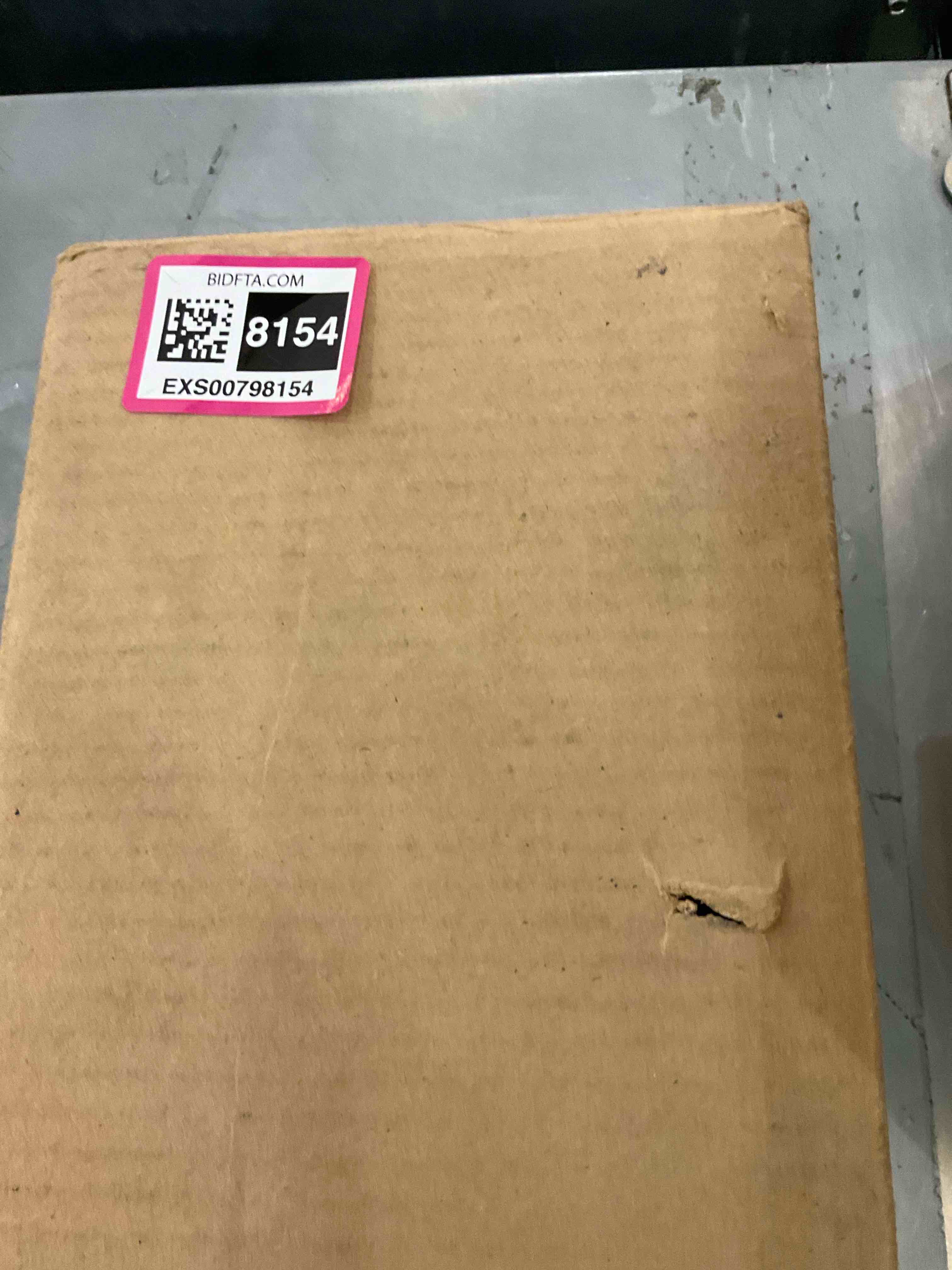 https://s3.amazonaws.com/lotting-images-prod/bidfta/EXS00798154_1701973545263.jpeg