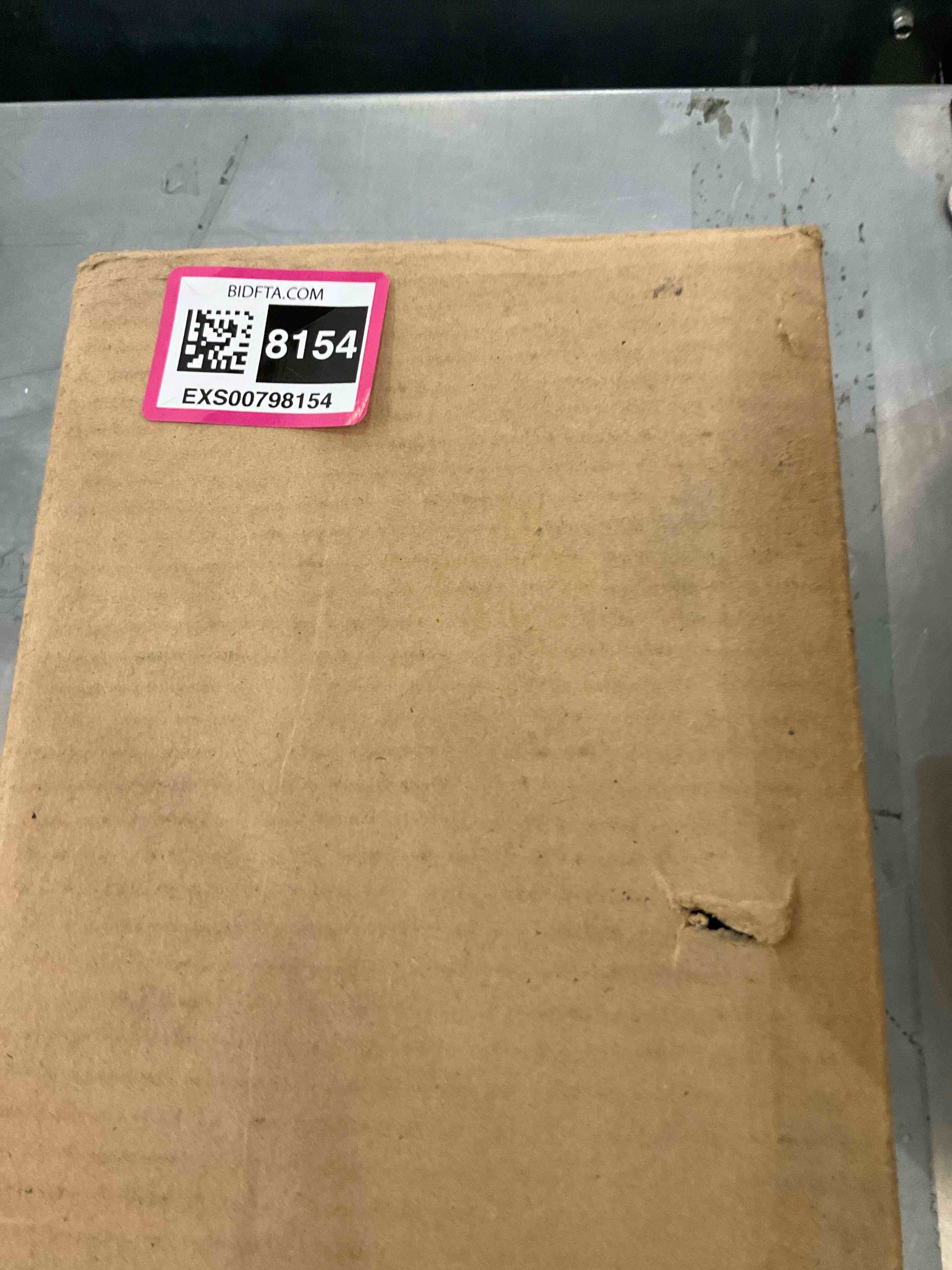https://s3.amazonaws.com/lotting-images-prod/bidfta/EXS00798154_1701973546130.jpeg