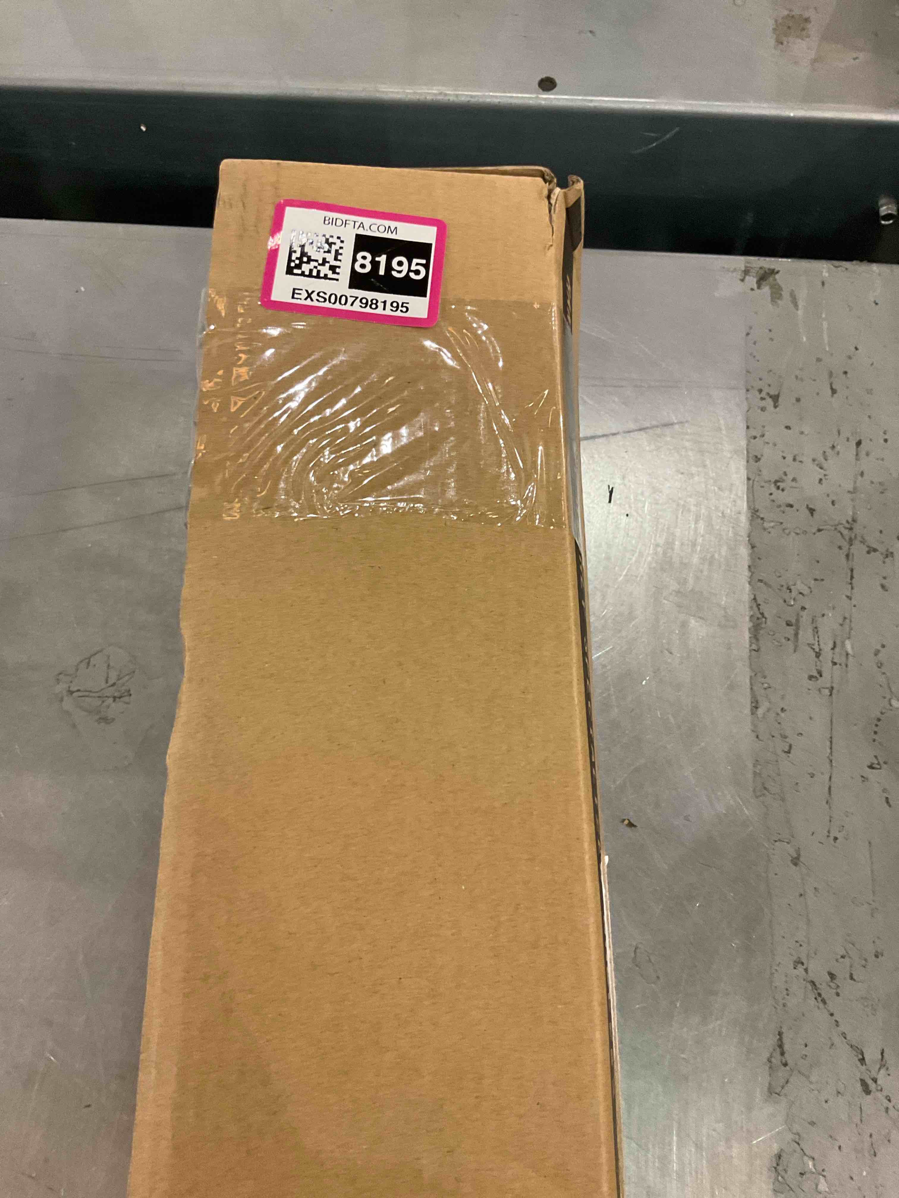 https://s3.amazonaws.com/lotting-images-prod/bidfta/EXS00798195_1701979495136.jpeg