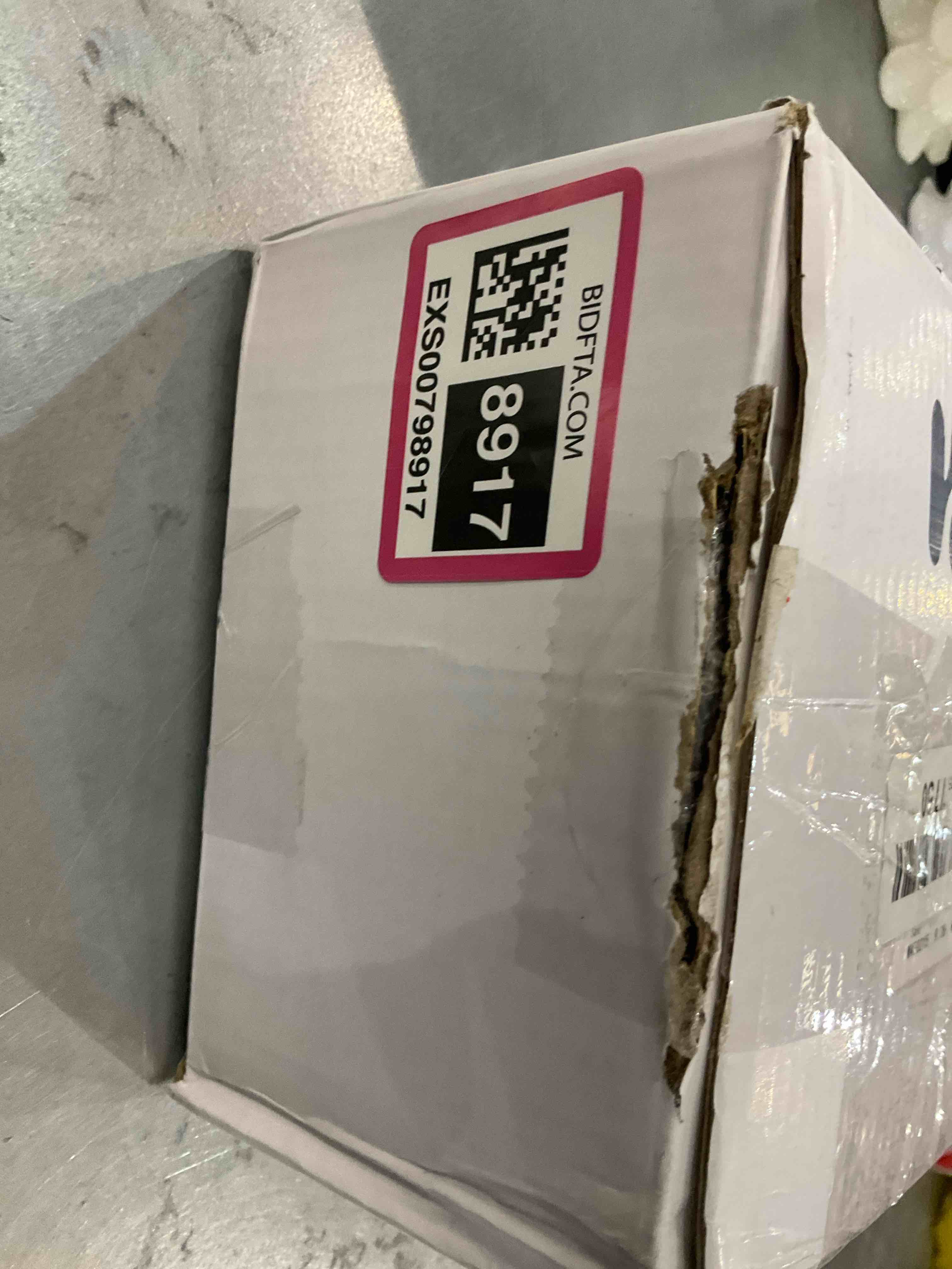 https://s3.amazonaws.com/lotting-images-prod/bidfta/EXS00798917_1702309799366.jpeg