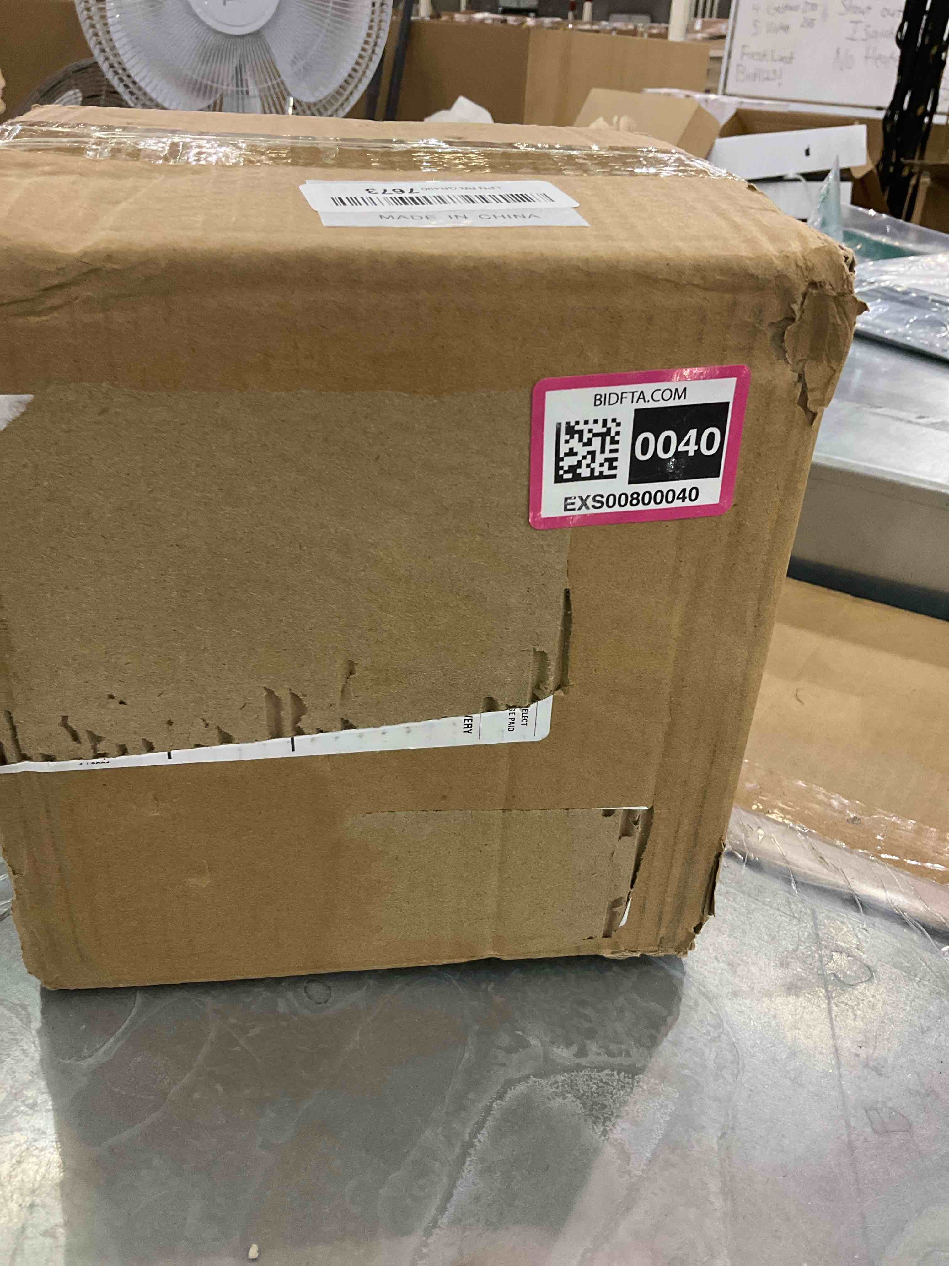 https://s3.amazonaws.com/lotting-images-prod/bidfta/EXS00800040_1699976563865.jpeg
