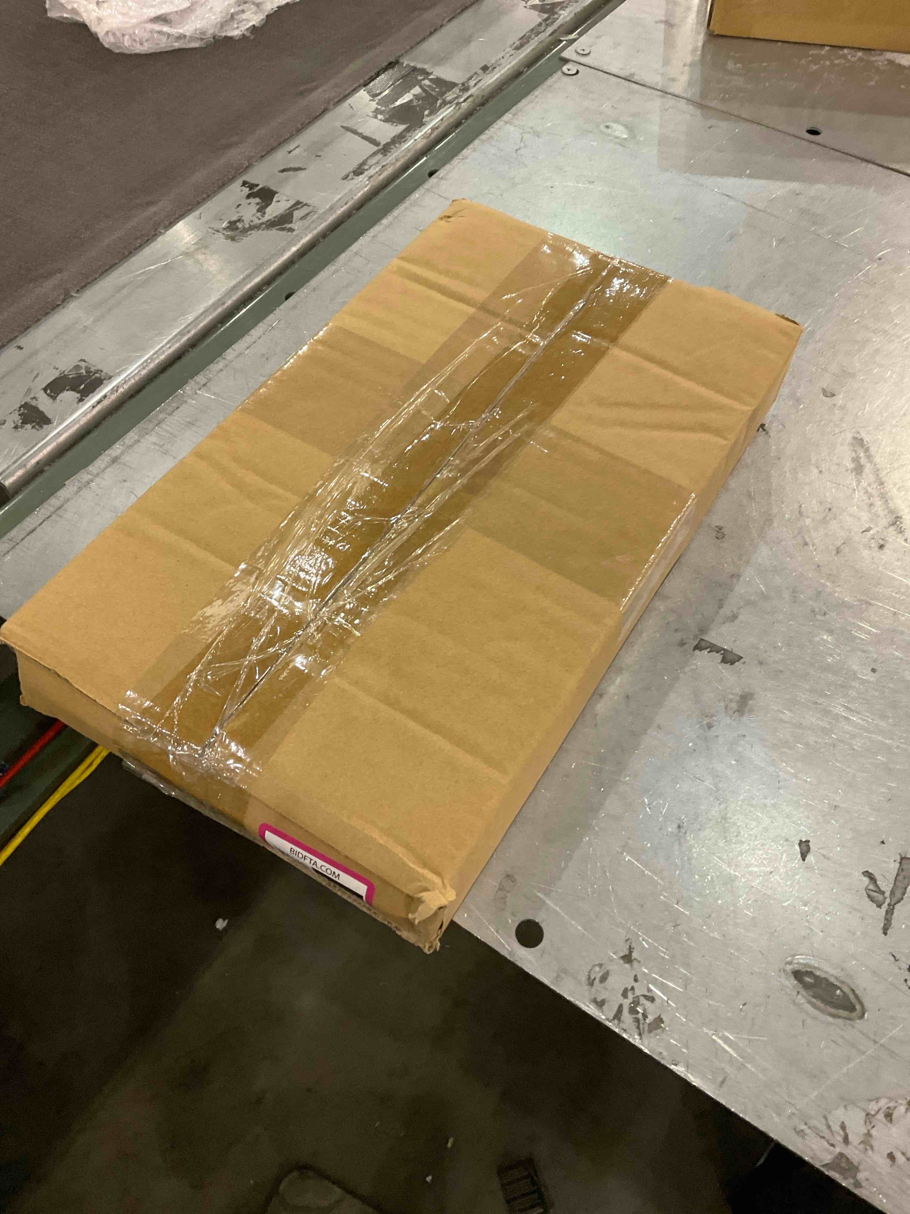https://s3.amazonaws.com/lotting-images-prod/bidfta/EXS00802825_1699534892786.jpeg