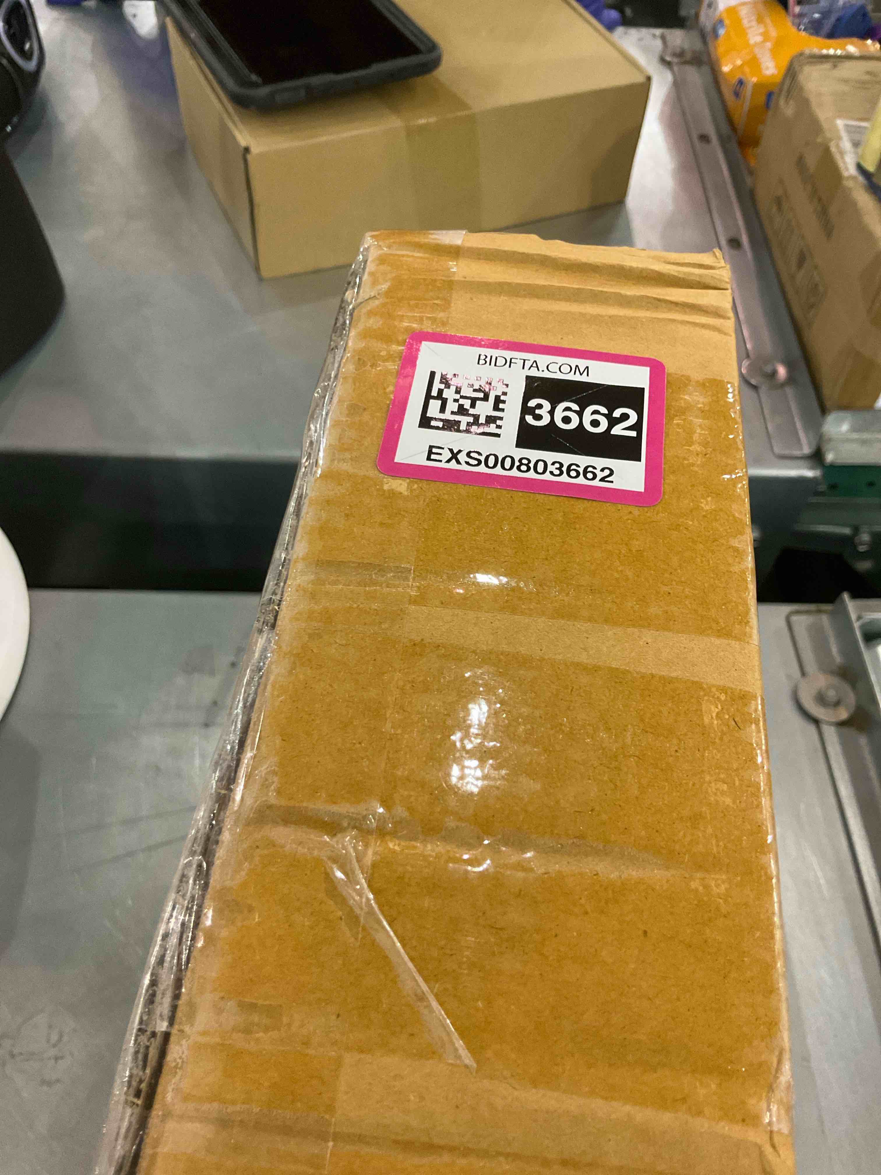 https://s3.amazonaws.com/lotting-images-prod/bidfta/EXS00803662_1700227838381.jpeg