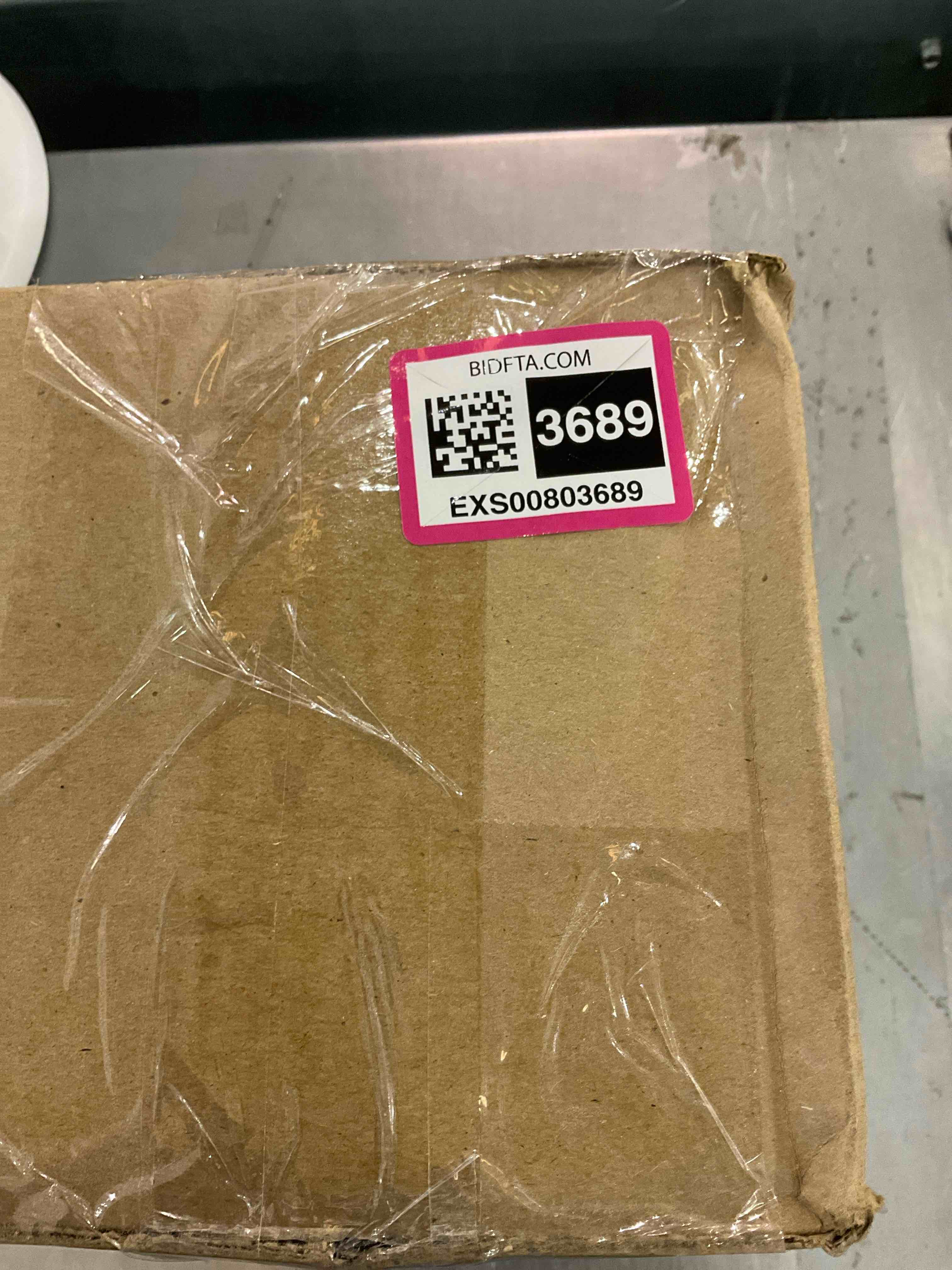 https://s3.amazonaws.com/lotting-images-prod/bidfta/EXS00803689_1700231624304.jpeg