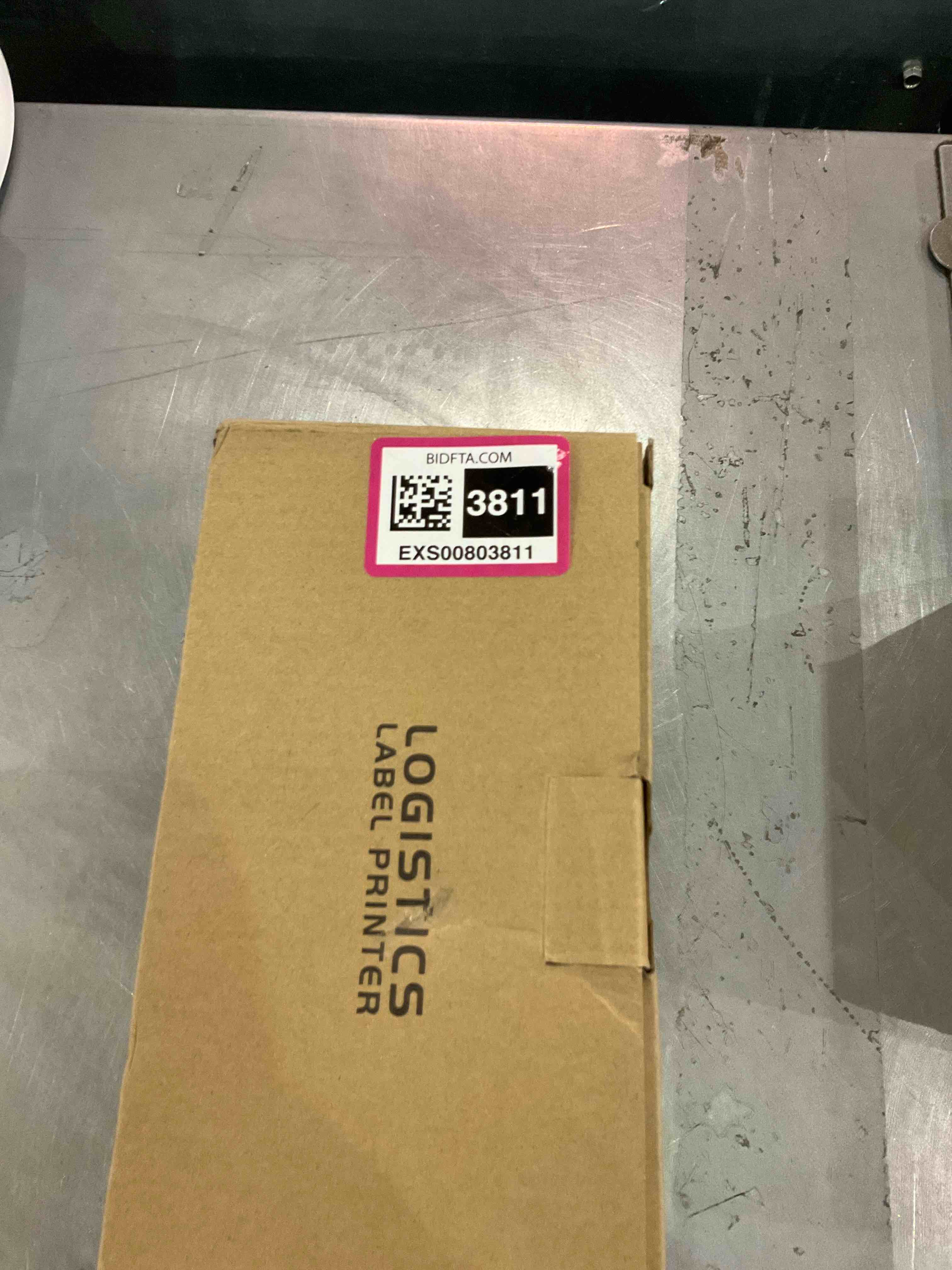 https://s3.amazonaws.com/lotting-images-prod/bidfta/EXS00803811_1700485622445.jpeg