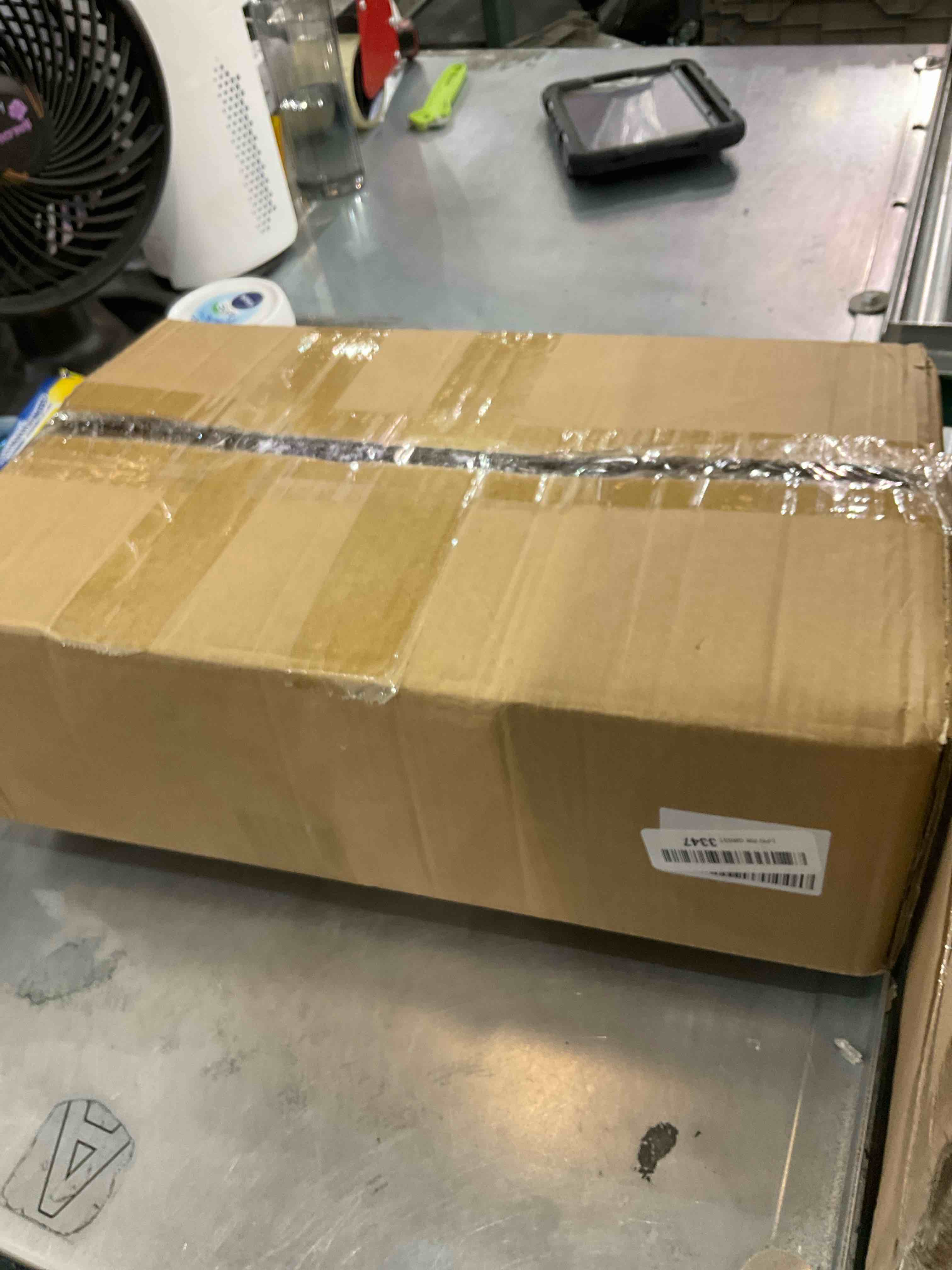 https://s3.amazonaws.com/lotting-images-prod/bidfta/EXS00805413_1699022116456.jpeg