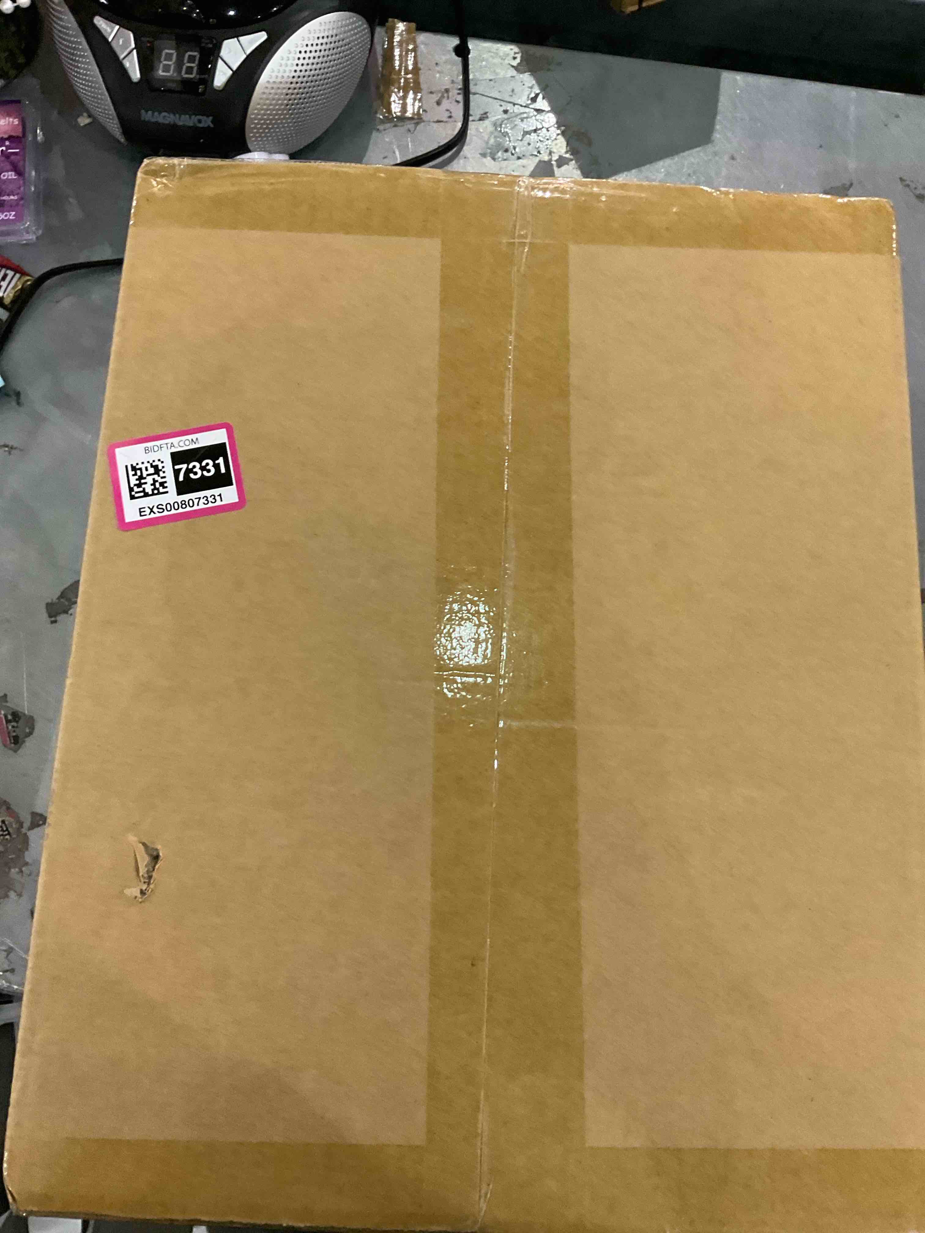 https://s3.amazonaws.com/lotting-images-prod/bidfta/EXS00807331_1700675759422.jpeg