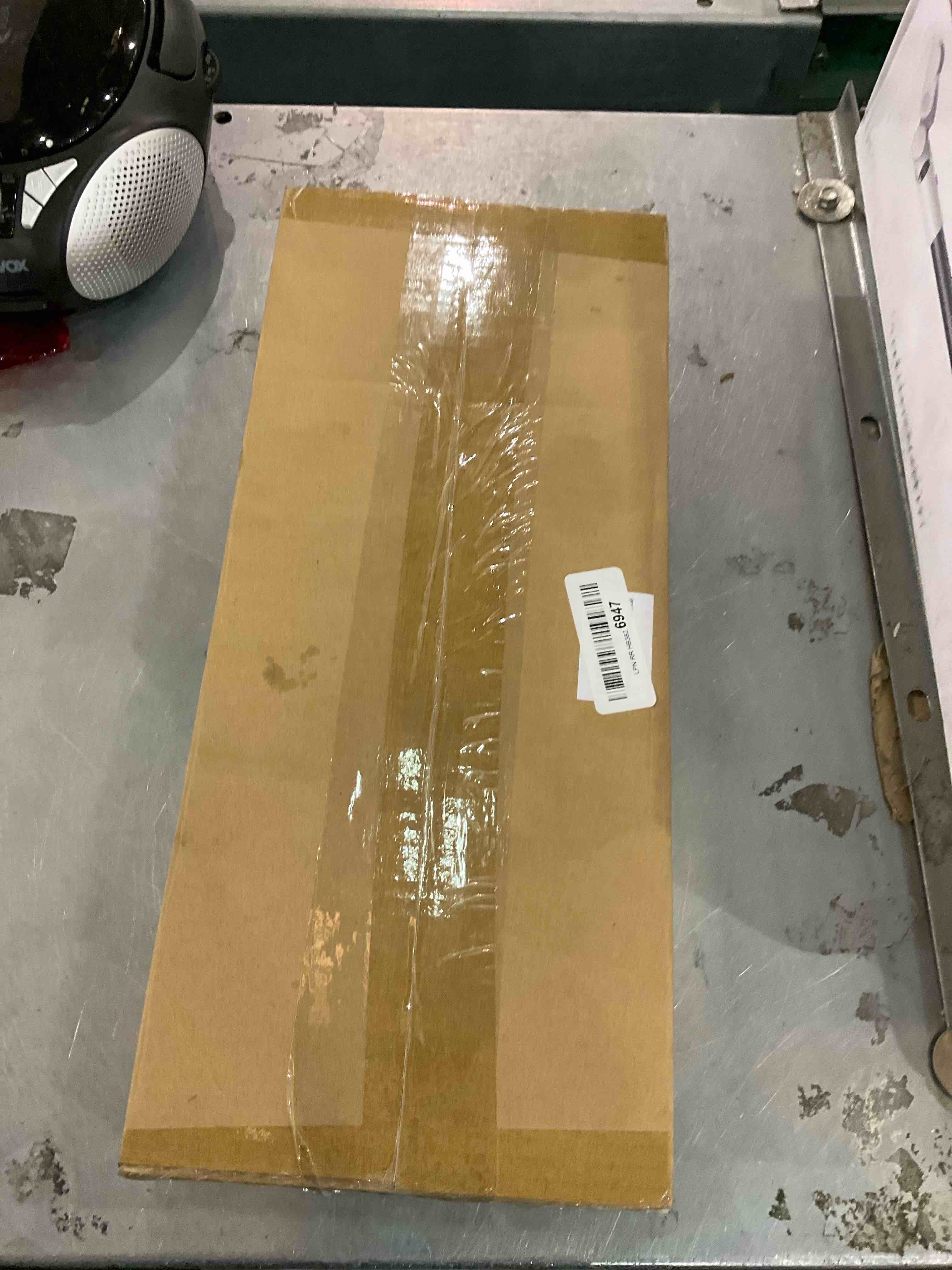 https://s3.amazonaws.com/lotting-images-prod/bidfta/EXS00807918_1700238203440.jpeg