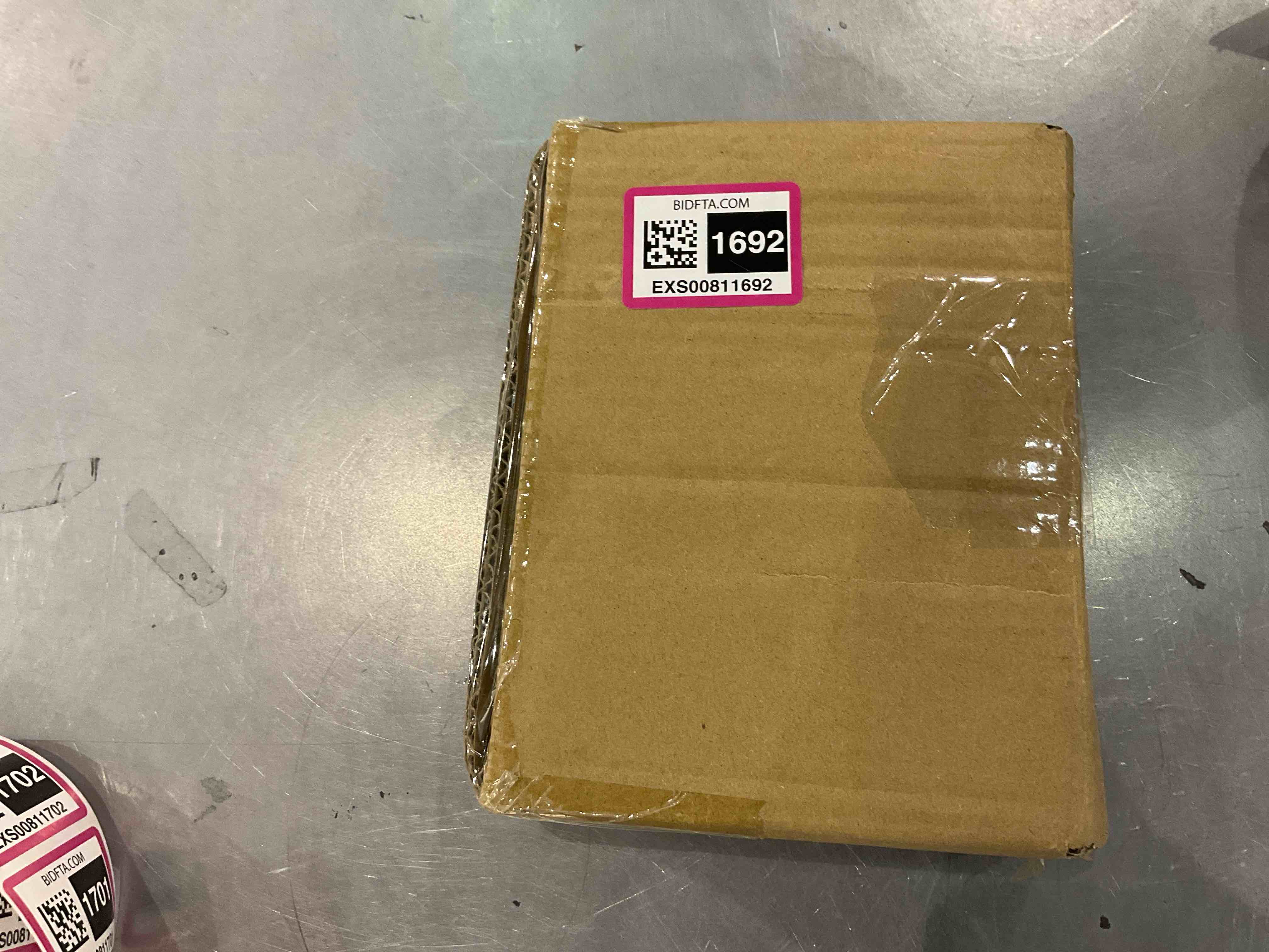 https://s3.amazonaws.com/lotting-images-prod/bidfta/EXS00811692_1698755425655.jpeg