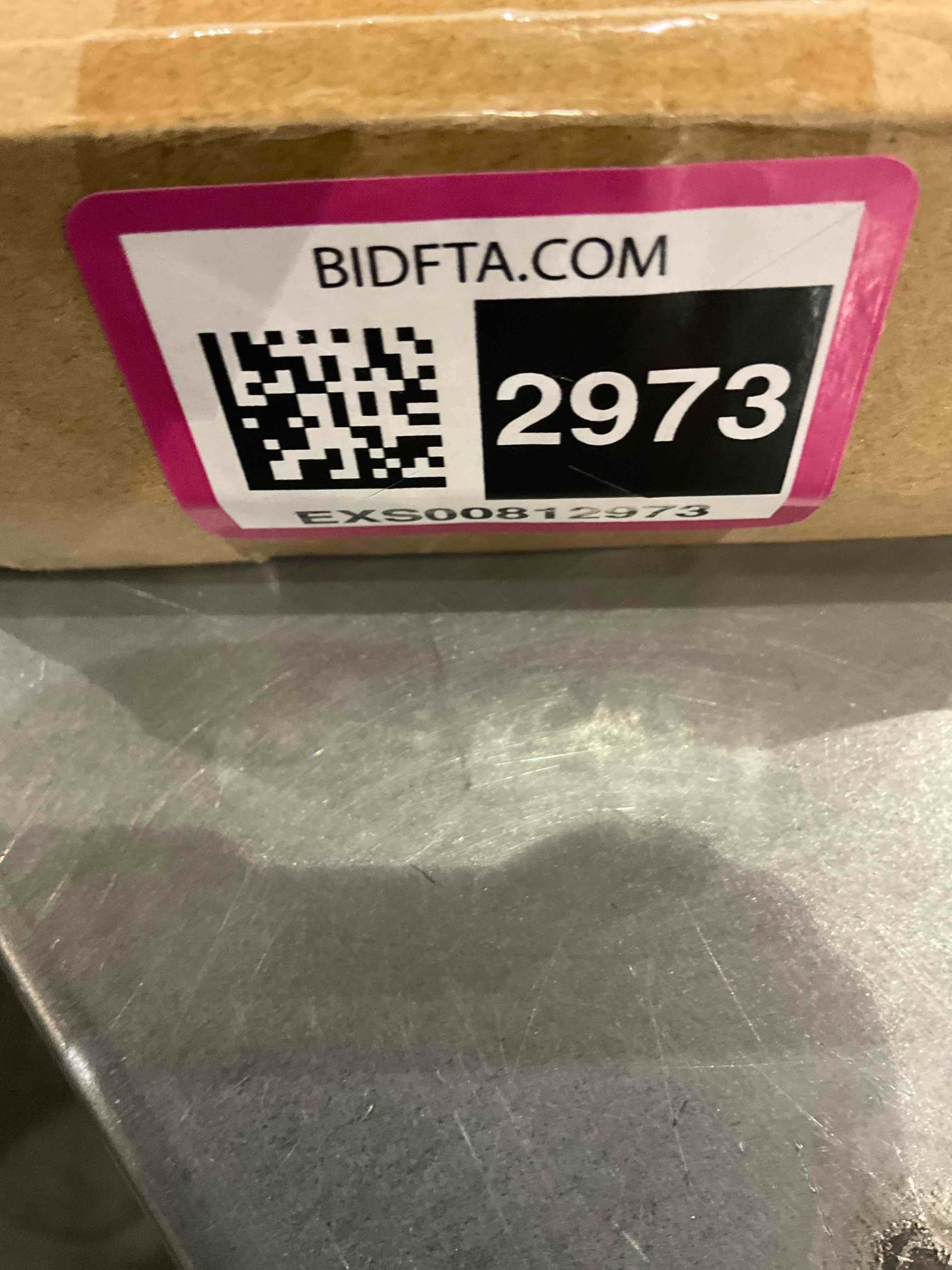 https://s3.amazonaws.com/lotting-images-prod/bidfta/EXS00812973_1698924214694.jpeg