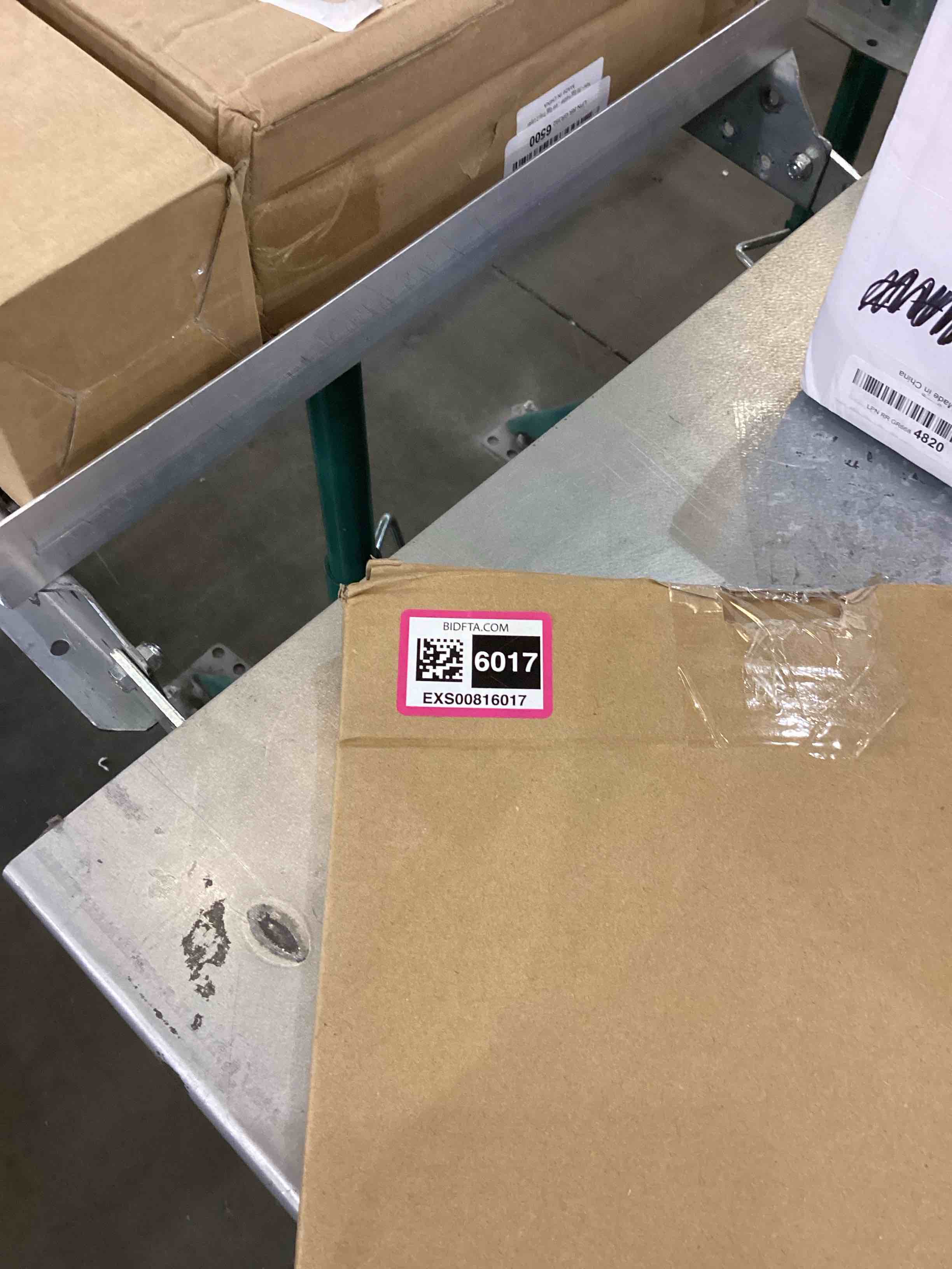 https://s3.amazonaws.com/lotting-images-prod/bidfta/EXS00816017_1698168837766.jpeg