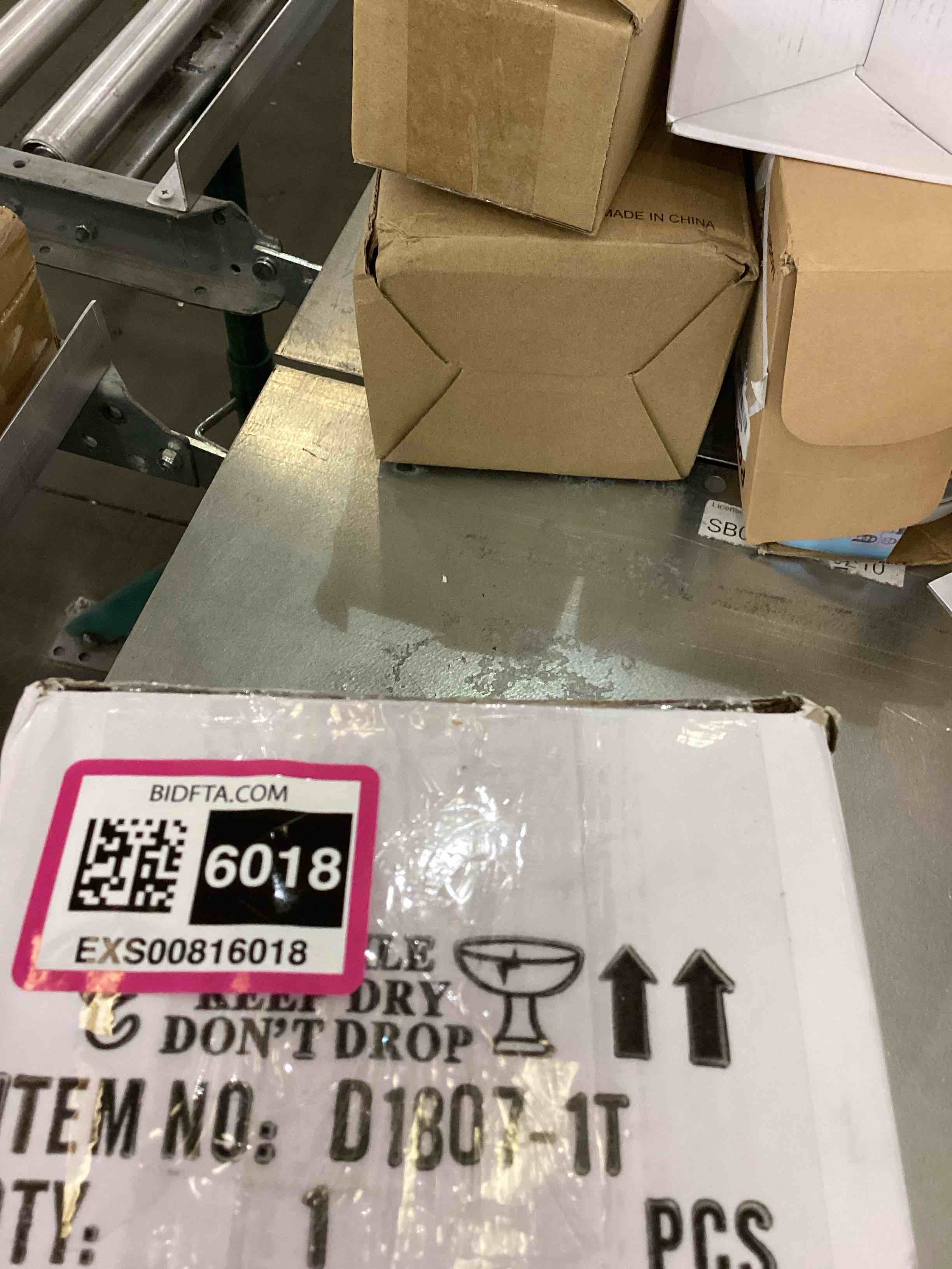 https://s3.amazonaws.com/lotting-images-prod/bidfta/EXS00816018_1698168935764.jpeg