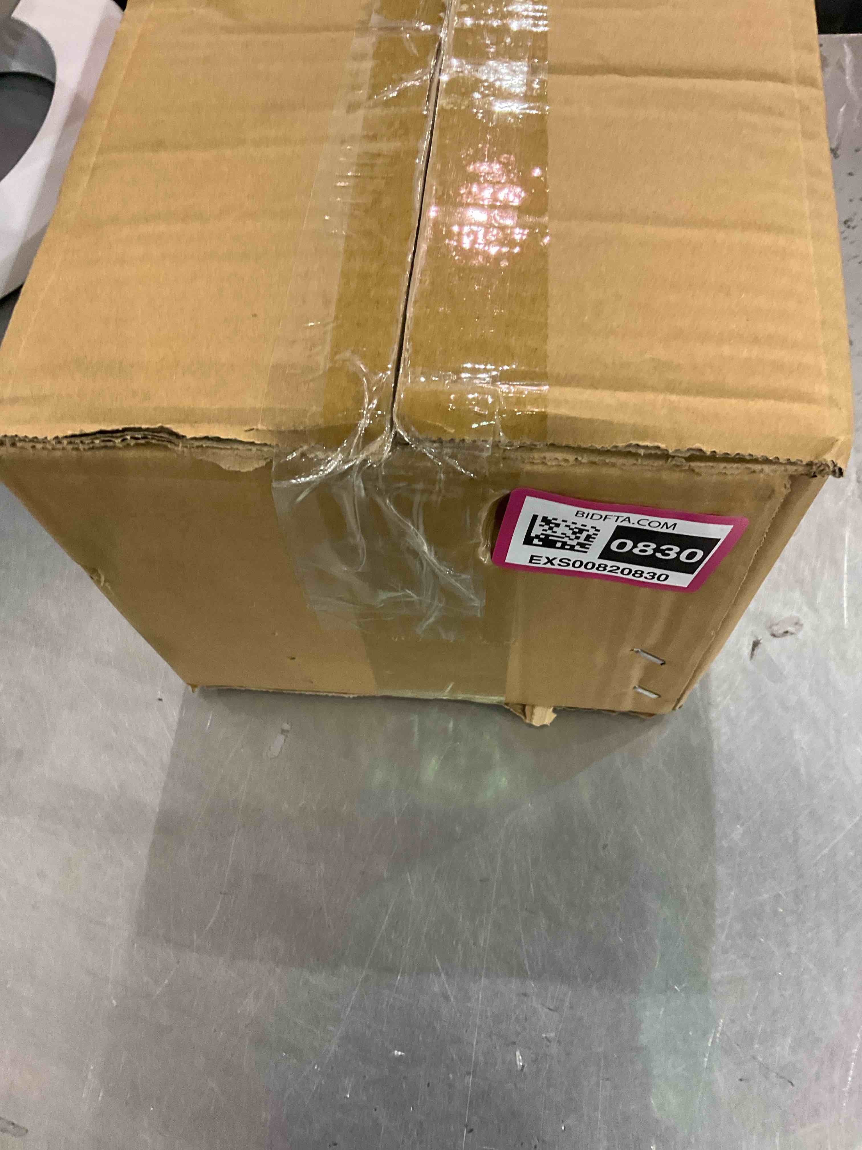 https://s3.amazonaws.com/lotting-images-prod/bidfta/EXS00820830_1699624362534.jpeg