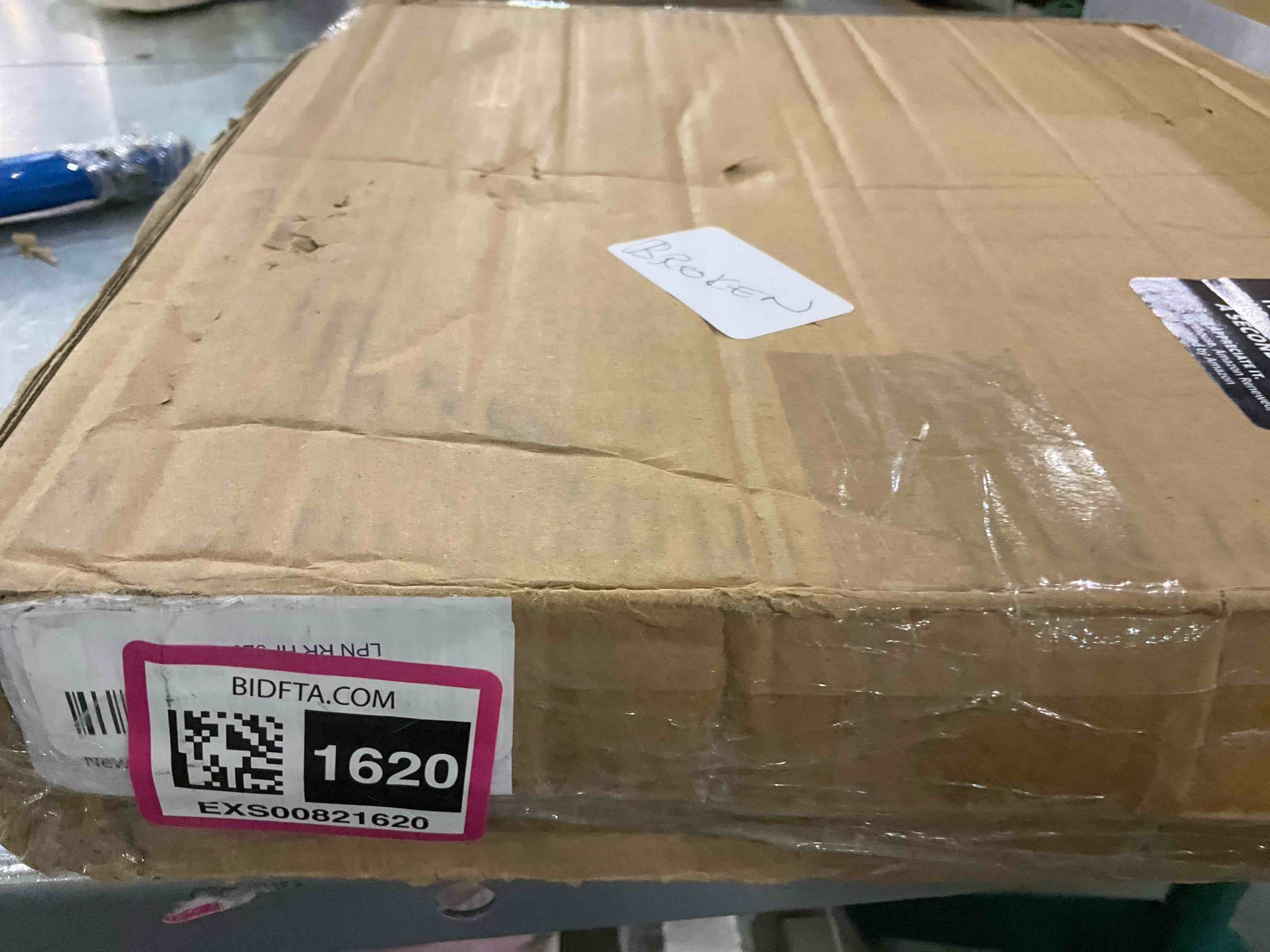 https://s3.amazonaws.com/lotting-images-prod/bidfta/EXS00821620_1703251706624.jpeg