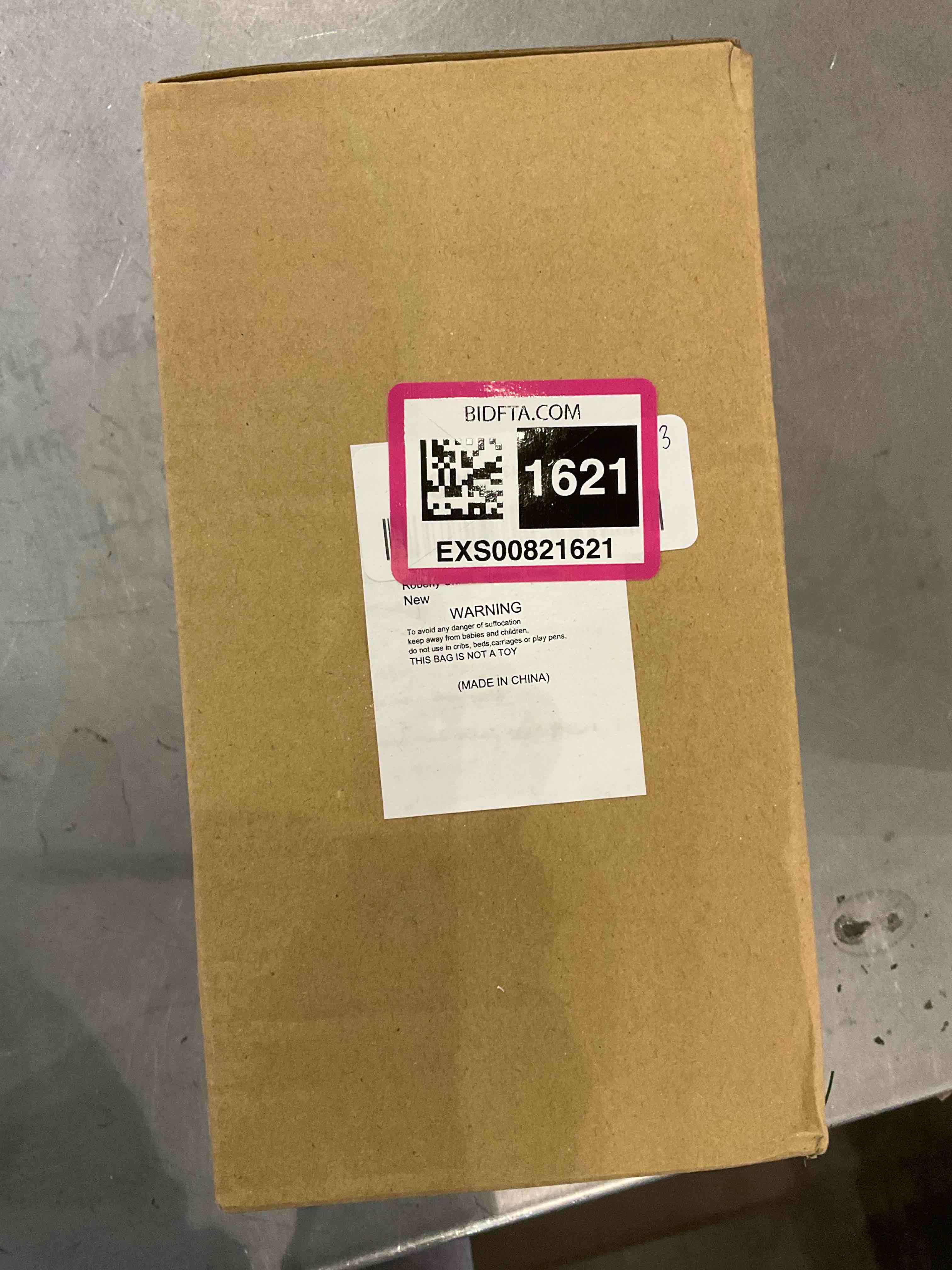 https://s3.amazonaws.com/lotting-images-prod/bidfta/EXS00821621_1703251742823.jpeg