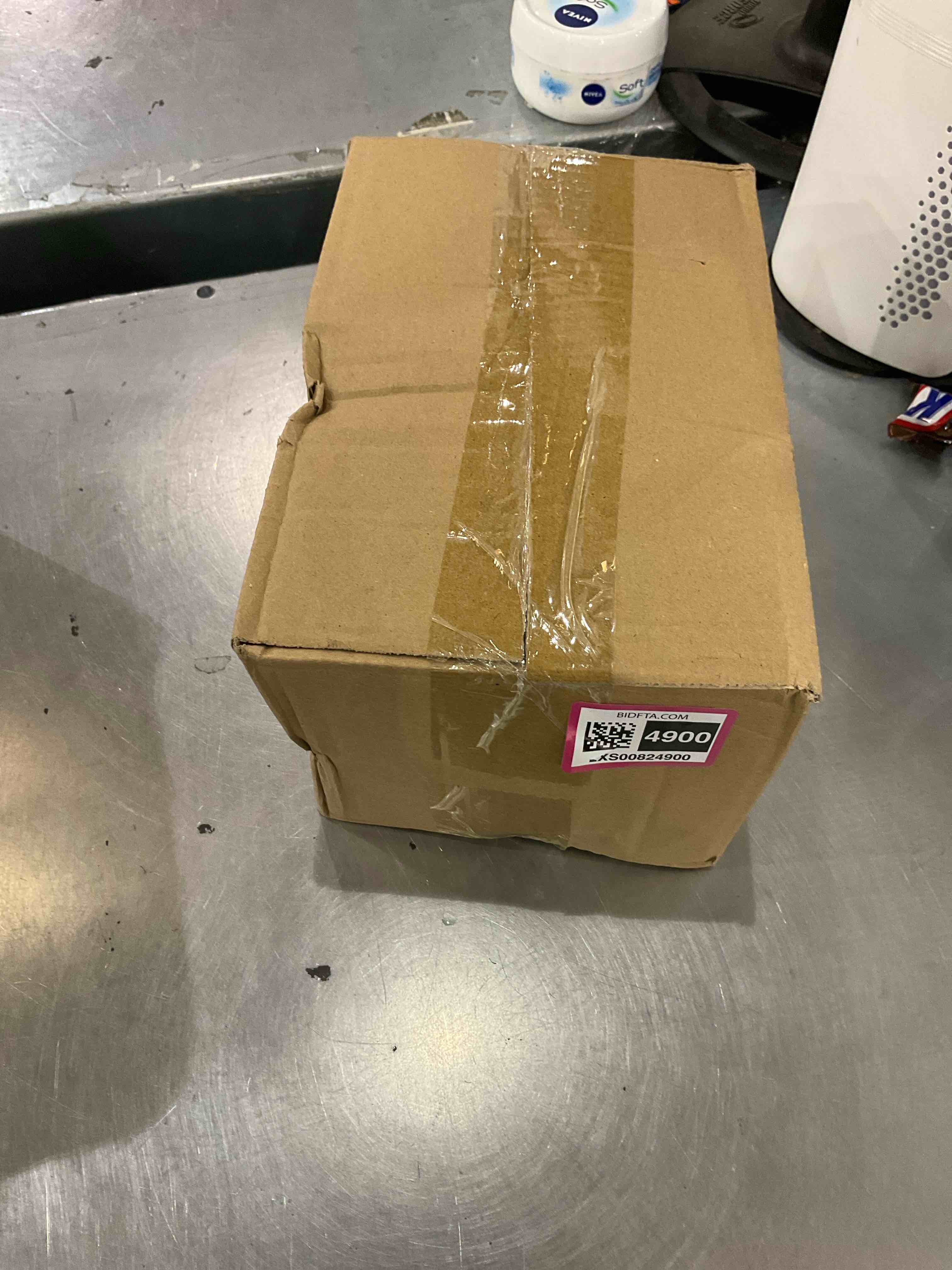 https://s3.amazonaws.com/lotting-images-prod/bidfta/EXS00824900_1699455748260.jpeg
