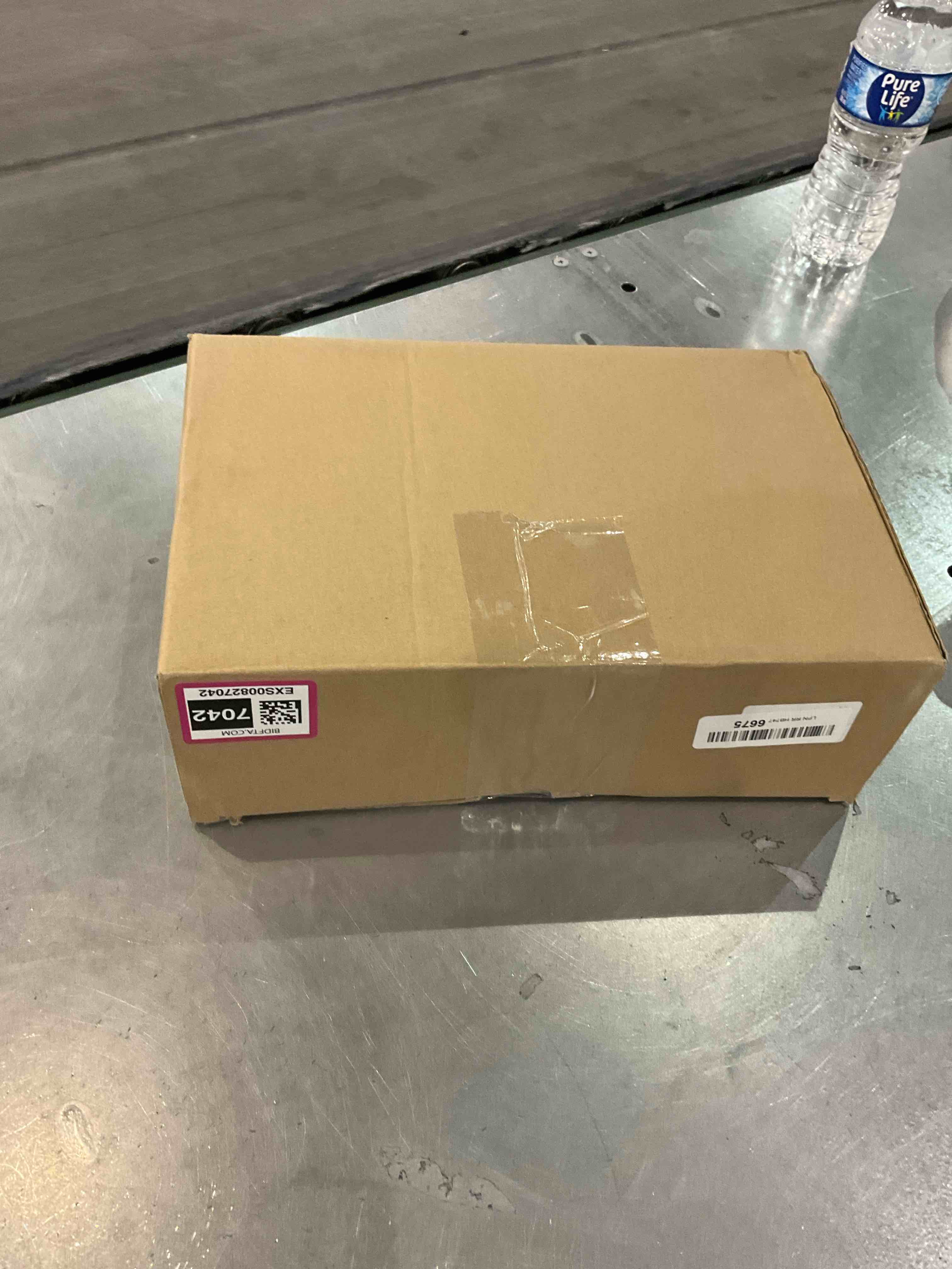 https://s3.amazonaws.com/lotting-images-prod/bidfta/EXS00827042_1699533201958.jpeg